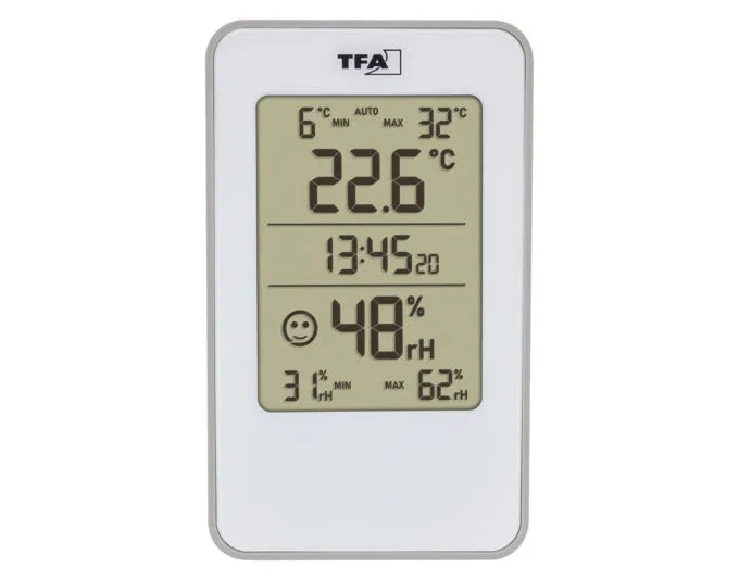 Digitales TFA Thermometer-Hygrometer in Weiß, misst Temperatur (-10 bis +60°C) und Luftfeuchtigkeit, kompakt und präzise.