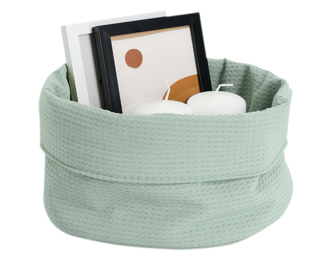 Moderner Aufbewahrungskorb aus Waffelpiqué in Mint, ideal für stilvolle Organisation. Maße: Ø 25x13 cm. Praktisch und dekorativ.