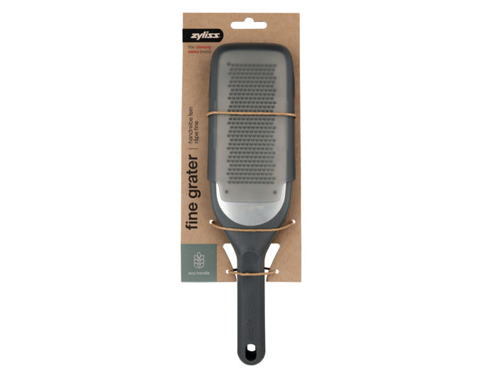 ZYLISS Handreibe fein aus Edelstahl und Weizenstroh-Kunststoff, ideal für präzises Reiben von Lebensmitteln, langlebig und ergonomisch.