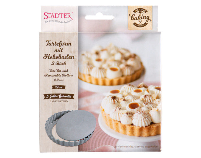 Set aus zwei silbernen Tarteformen (ø 12 cm) mit Hebeboden, ideal für Backliebhaber. Perfekt für kleine Tarts und Quiches.