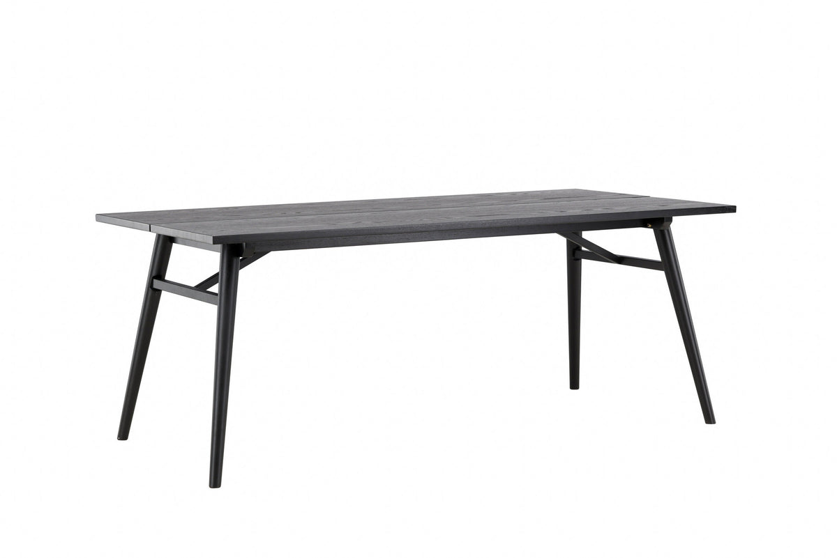 Sleek ausziehbarer Tisch in Schwarz präsentiert im Onlineshop von KAQTU Design AG. Esstisch ist von Venture Home