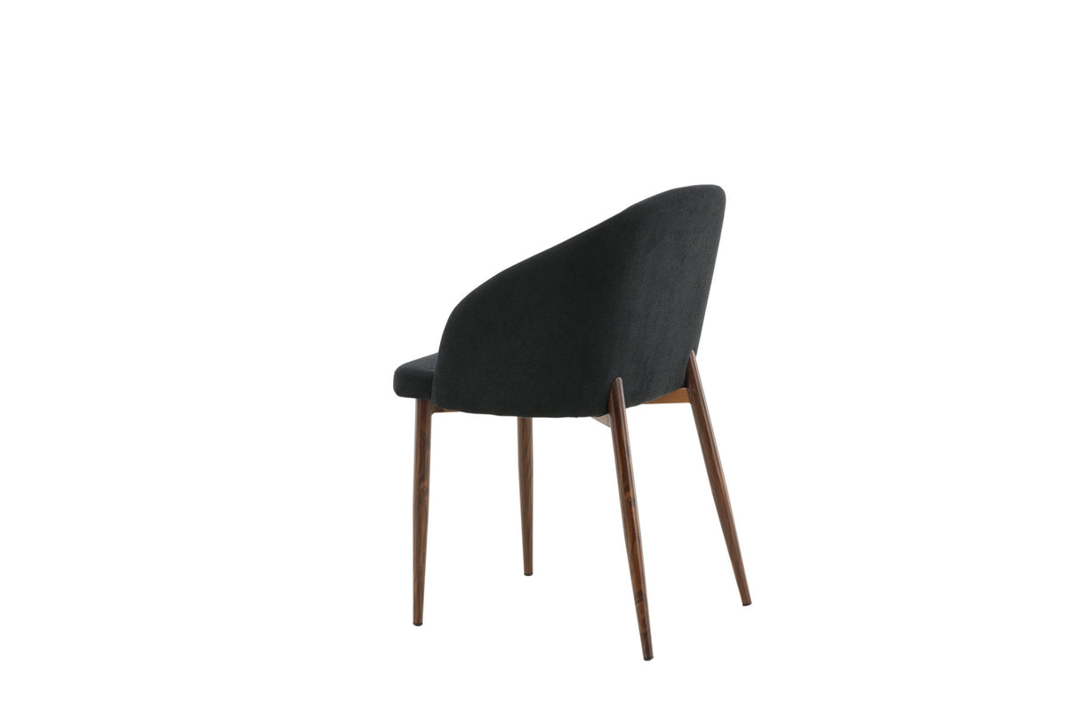 Bogenstuhl in Schwarz präsentiert im Onlineshop von KAQTU Design AG. Schalenstuhl mit Armlehne ist von Venture Home
