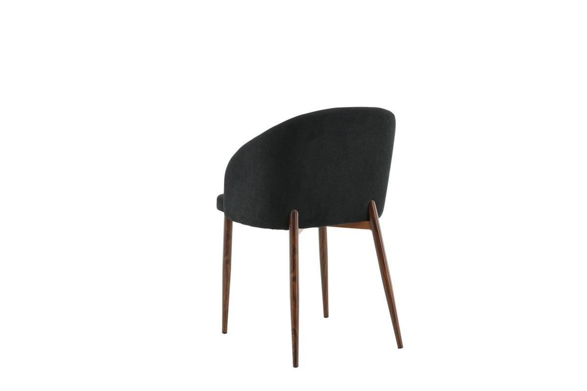 Bogenstuhl in Schwarz präsentiert im Onlineshop von KAQTU Design AG. Schalenstuhl mit Armlehne ist von Venture Home