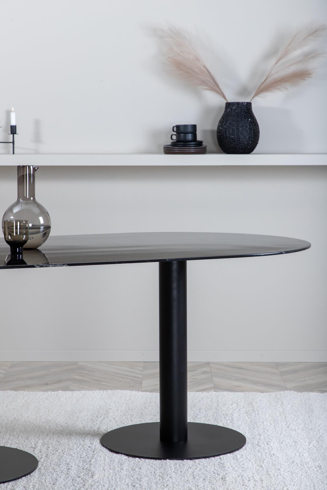Pillan Tisch von Venture Home: Eleganter ovaler Esstisch mit Marmormuster und robustem Trompetengestell für gesellige Anlässe.