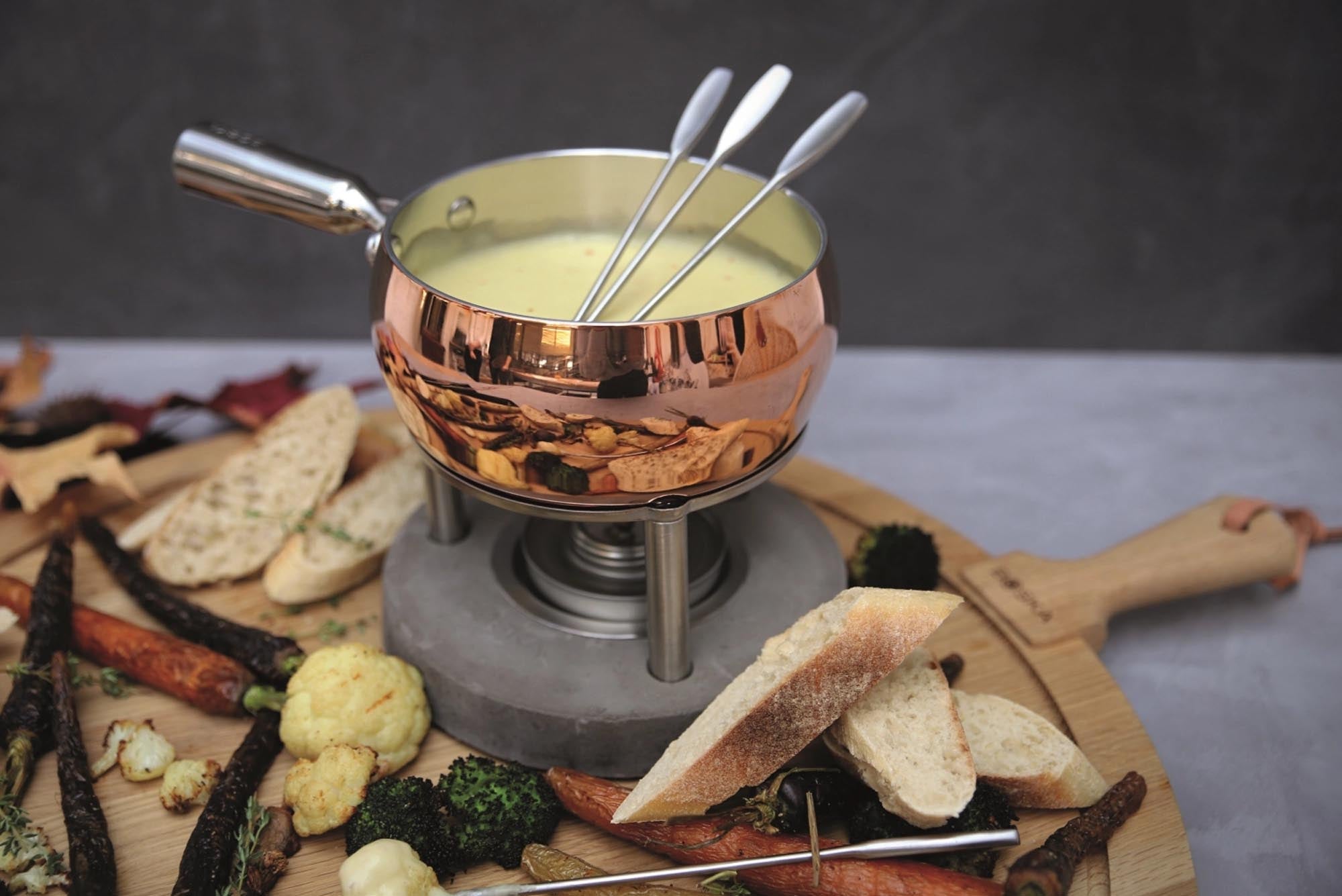 Elegantes Boska Fondue-Set aus Kupfer für gesellige Genussmomente.