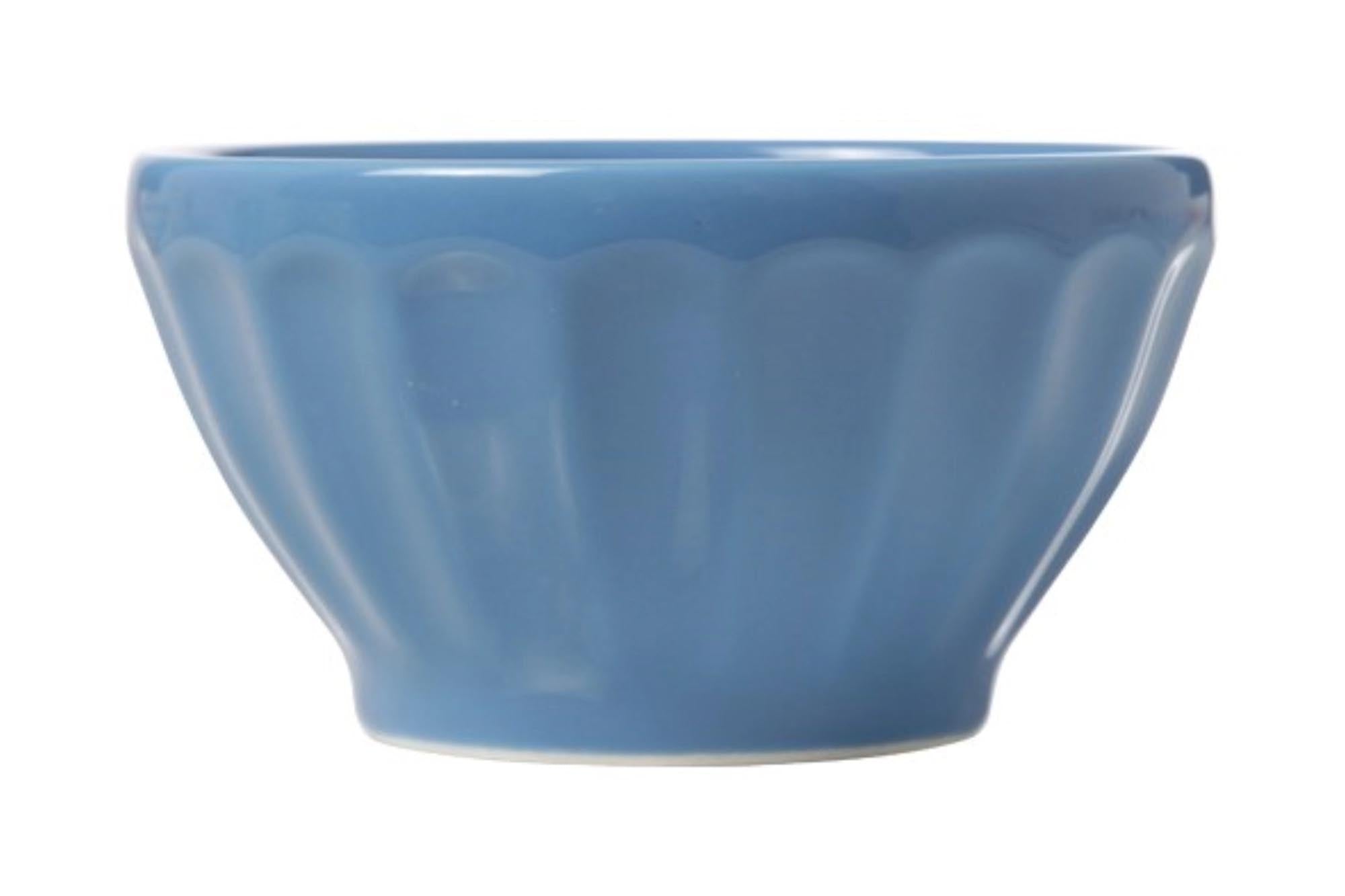 Die Facetta Schüssel in Blau von Cosy & Trendy, Ø 14 x 7,5 cm, aus robustem Steinzeug, vereint Stil und Funktionalität für Salate, Snacks und Desserts.