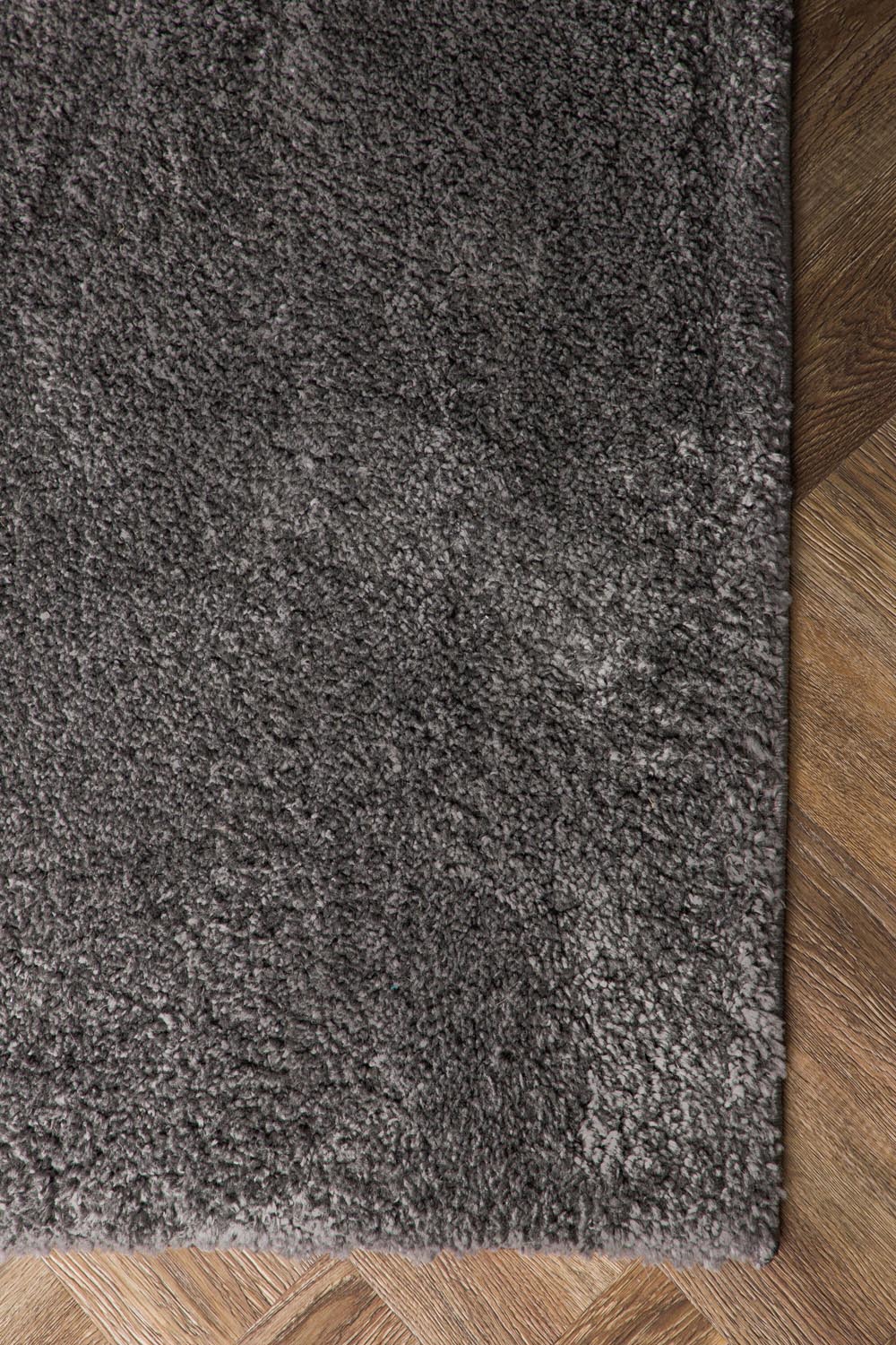 Walter Pluto Teppich Rechteckig in Dunkelgrau präsentiert im Onlineshop von KAQTU Design AG. Teppich ist von Venture Home