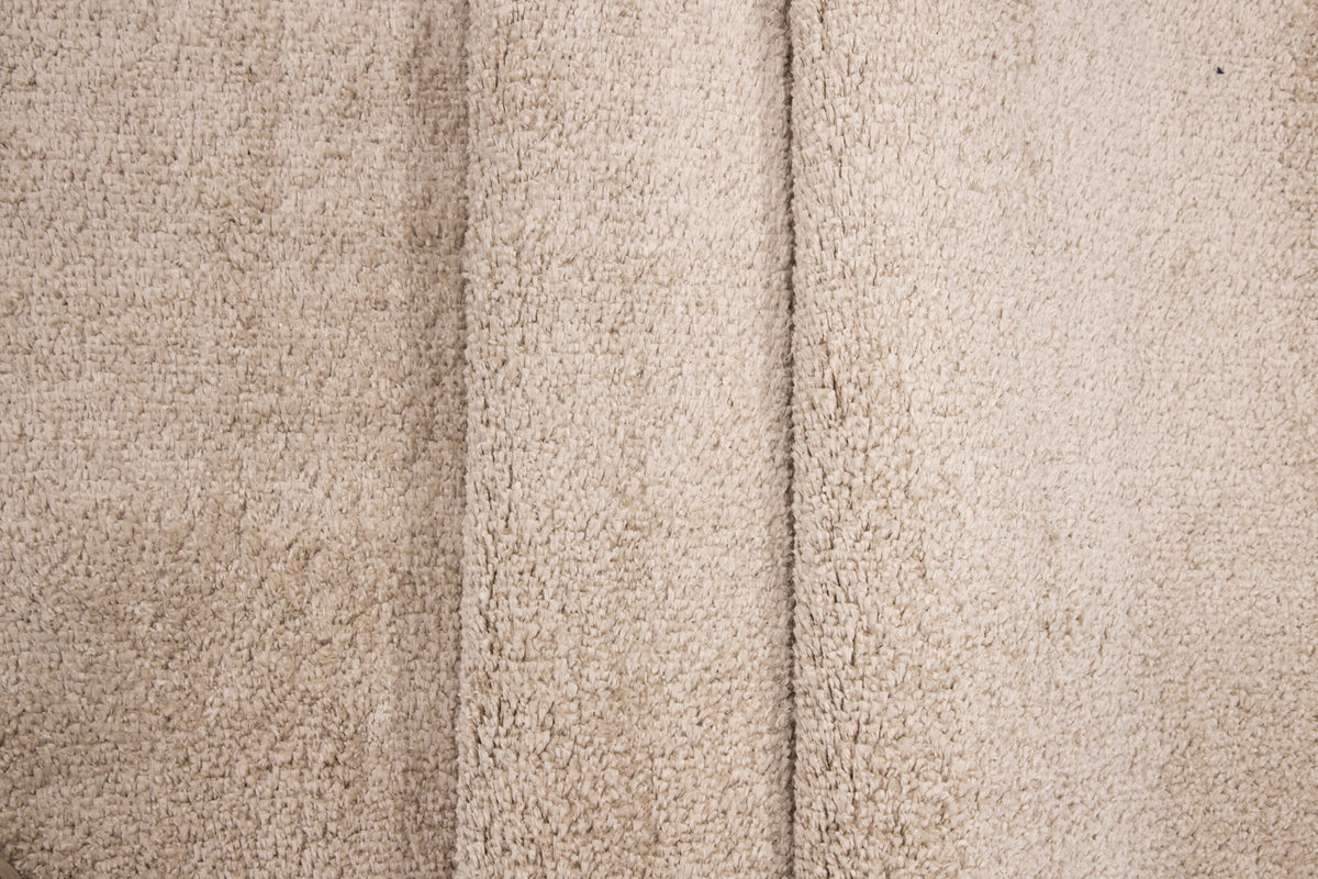 Walter Pluto Teppich Oval in Beige präsentiert im Onlineshop von KAQTU Design AG. Teppich ist von Venture Home