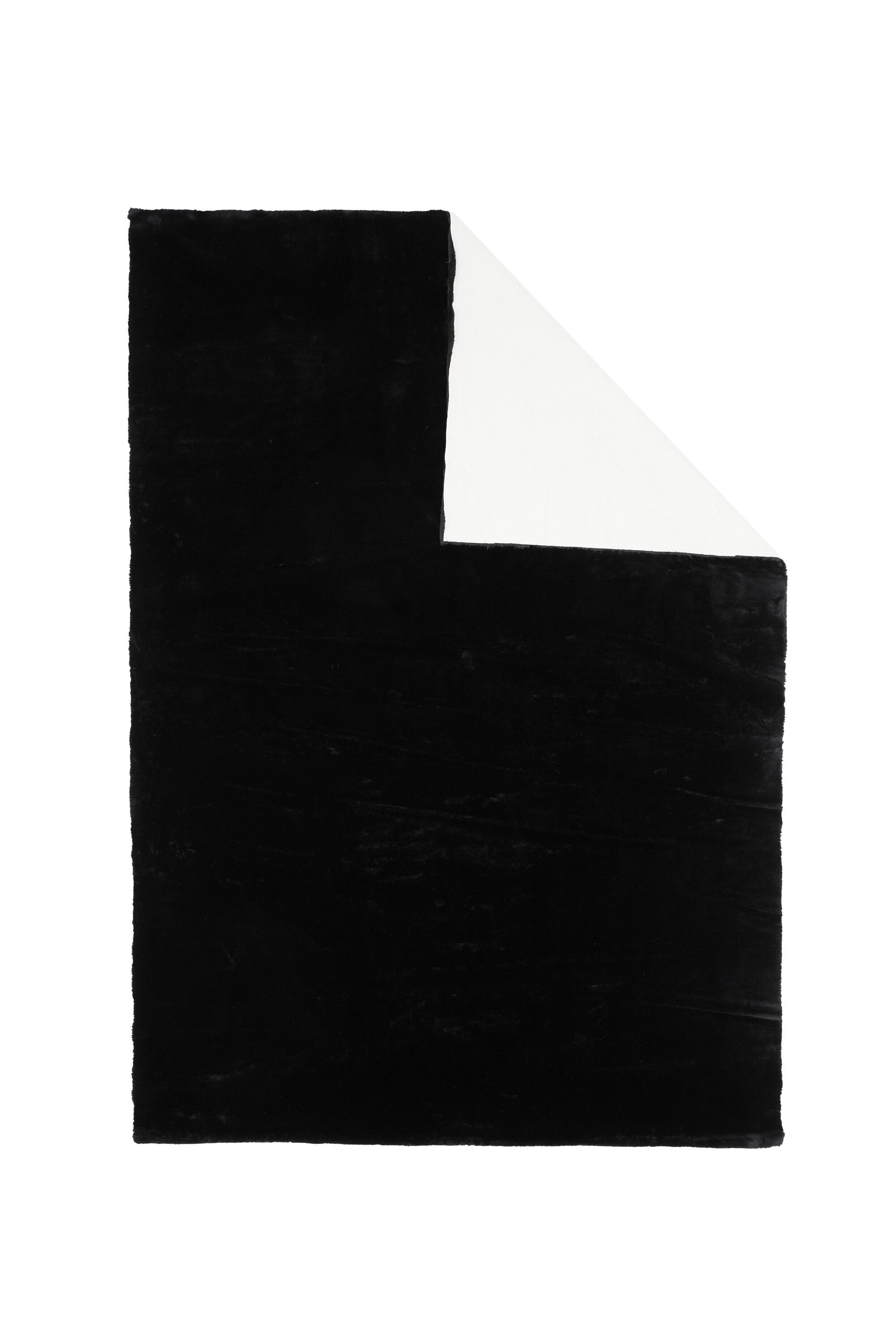 Nina Teppich in Schwarz präsentiert im Onlineshop von KAQTU Design AG. Teppich ist von Venture Home