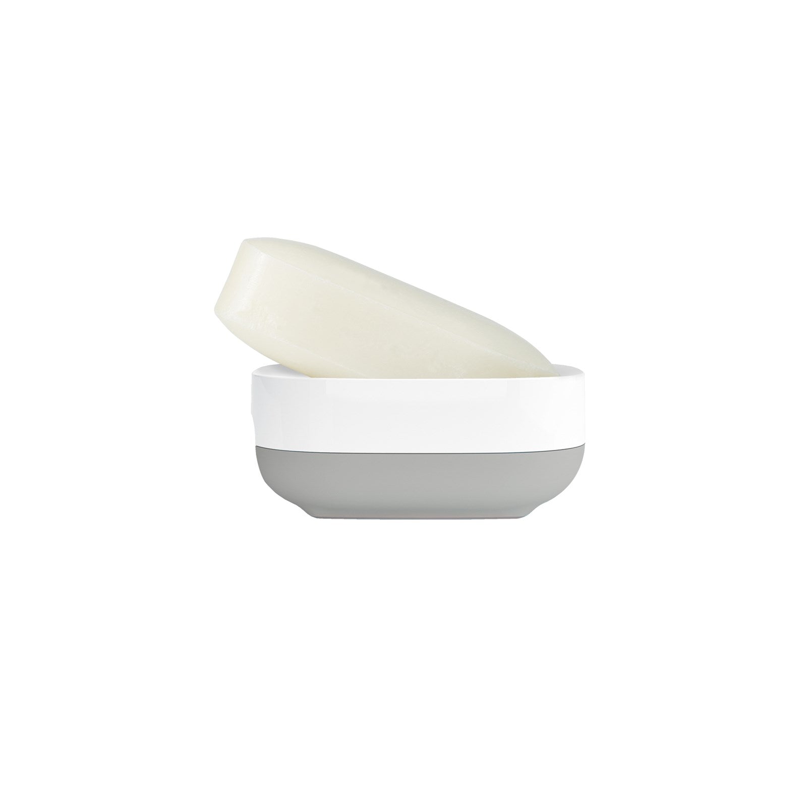 Der Slim Compact Seifenbehälter von Joseph Joseph in modernem Weiss und Grau vereint Funktionalität und Stil, ideal für kleine Badezimmer und Gäste-WCs.
