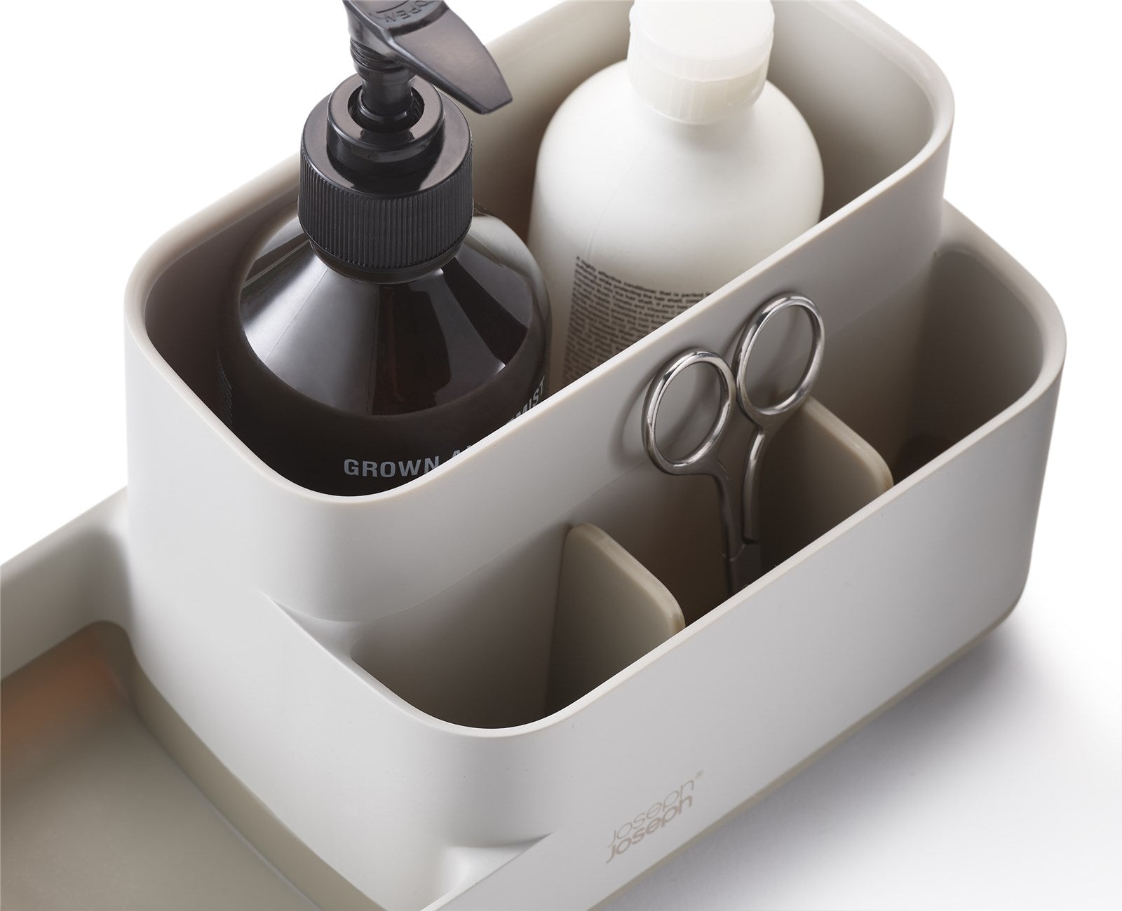 Der EasyStore Badezimmer Caddy in elegantem Ecru von Joseph Joseph vereint Funktionalität und Stil für eine ordentliche Badorganisation.