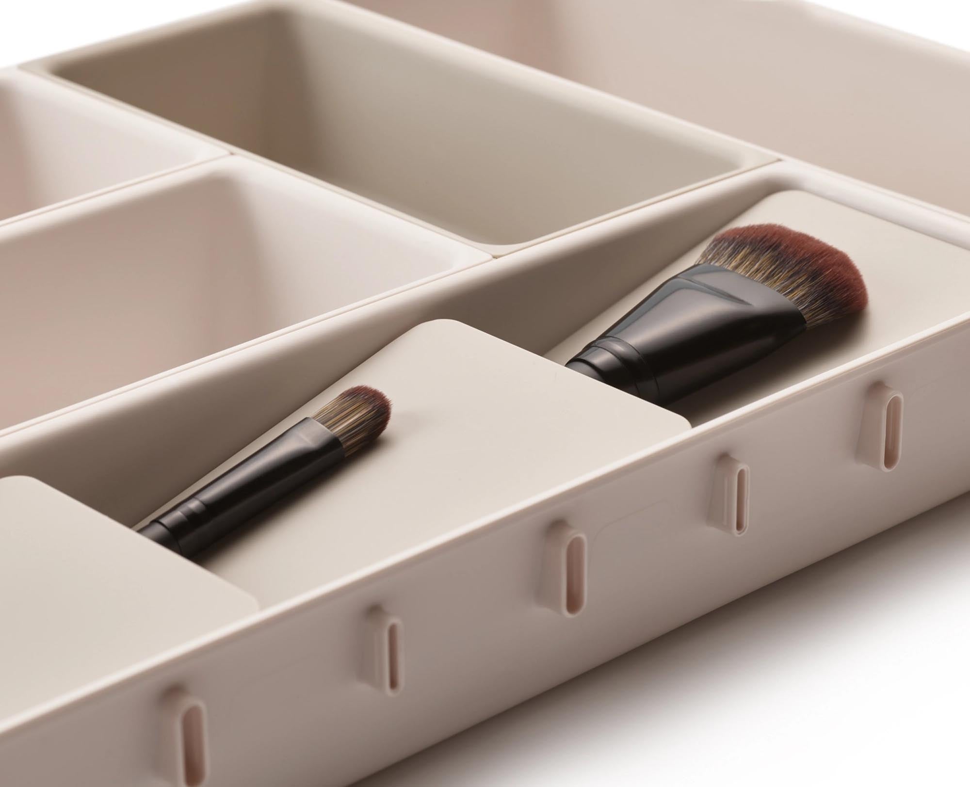 Elegantes 7-teiliges Makeup-Set von Joseph Joseph: Platzsparend, langlebig, feuchtigkeitsresistent, ideal für Kosmetikorganisation.
