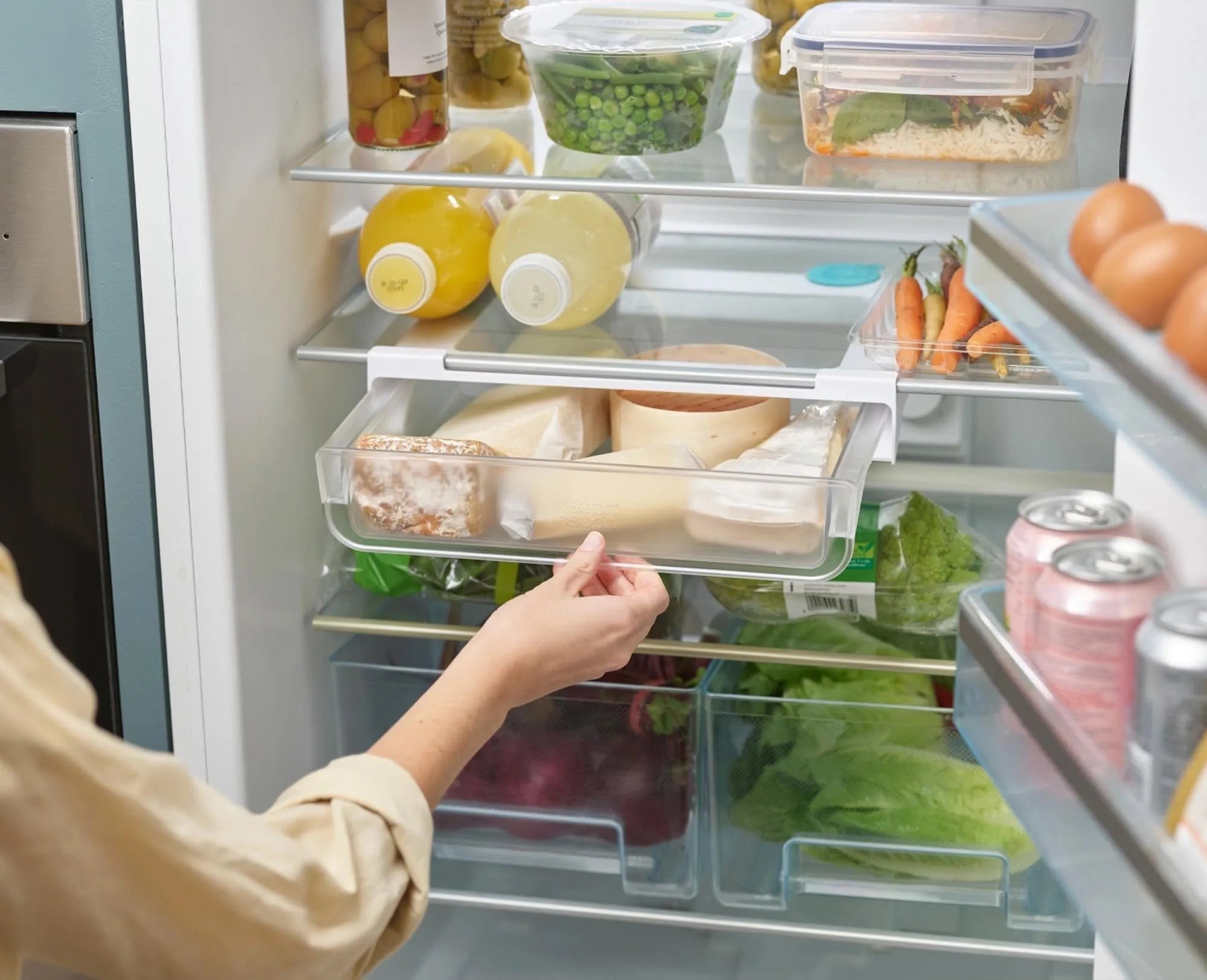 Maximale Kühlschranknutzung mit der FridgeStore Tablar Schublade.