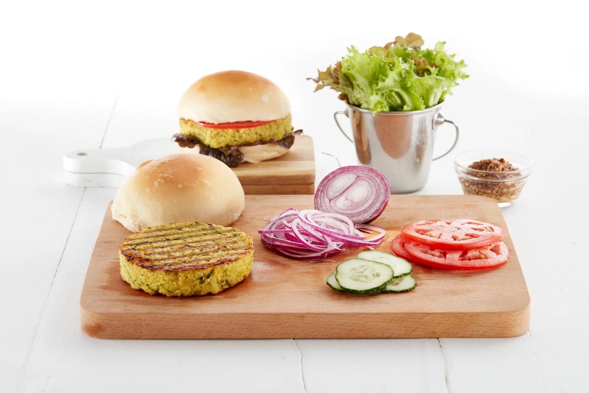 Veggie Burger in Grün/Weiss präsentiert im Onlineshop von KAQTU Design AG. Küchenhelfer ist von Lékué