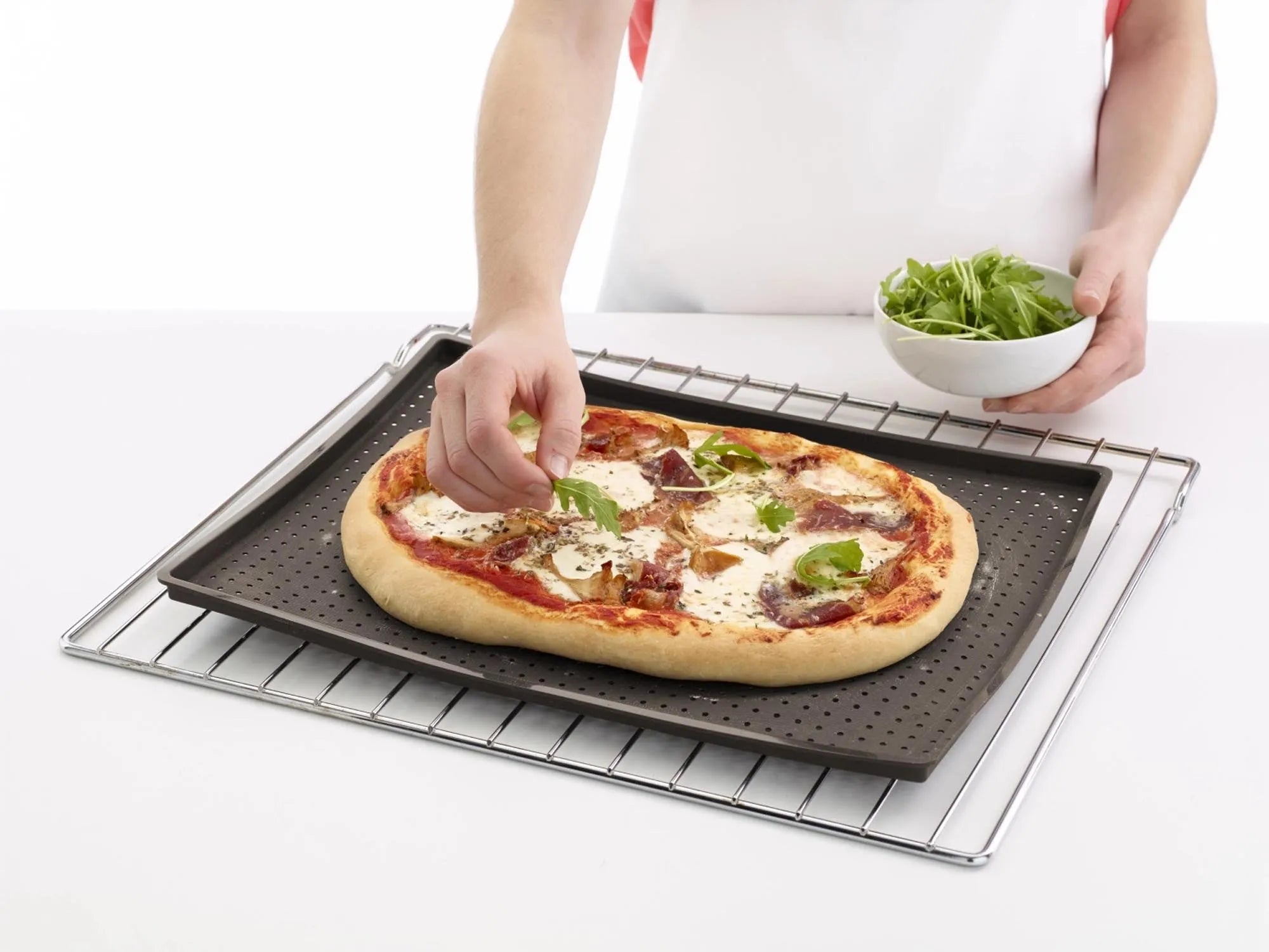 Lékué Backmatte: Perfekte Pizza mit innovativer Luftzirkulation.