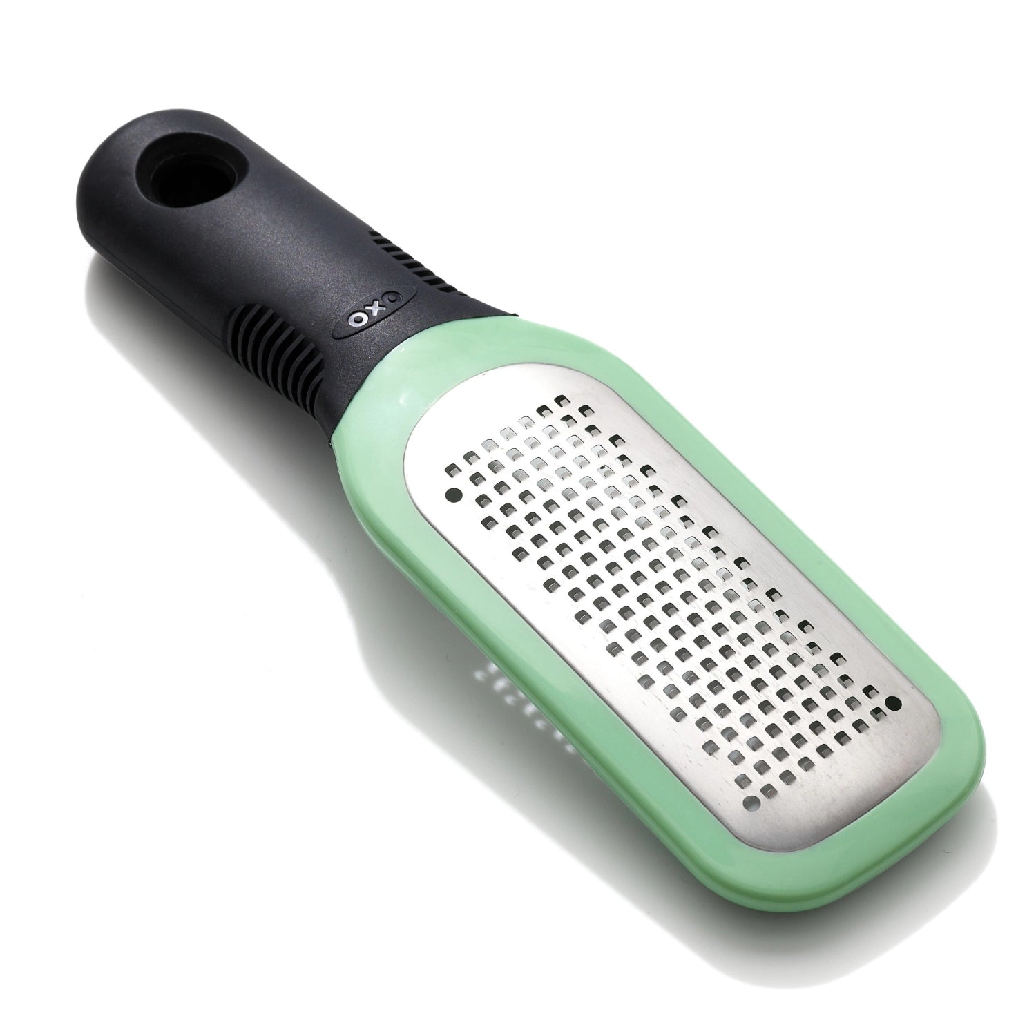 Praktische OXO Reibe für Ingwer und Knoblauch, mit scharfer geätzter Klinge, ideal für feines Reiben und einfache Handhabung.