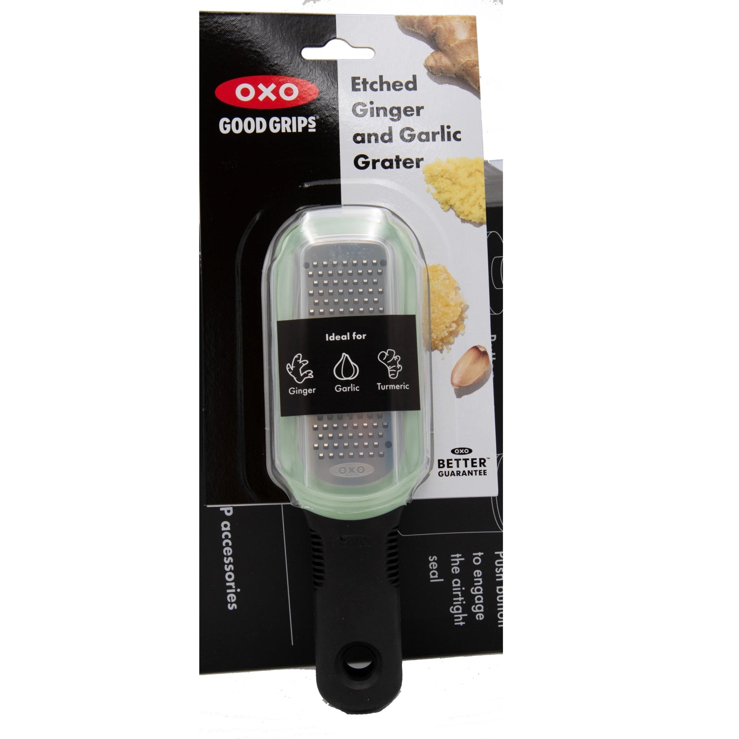 Effiziente OXO Reibe für Ingwer und Knoblauch, mit präziser geätzter Klinge, perfekt für feines Reiben und komfortable Nutzung.