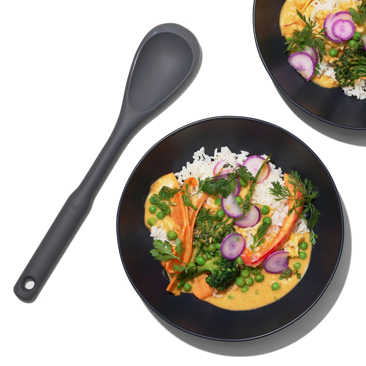 OXO Kochlöffel aus Silikon, ideal zum Rühren und Servieren, hitzebeständig und ergonomisch gestaltet für komfortables Kochen.