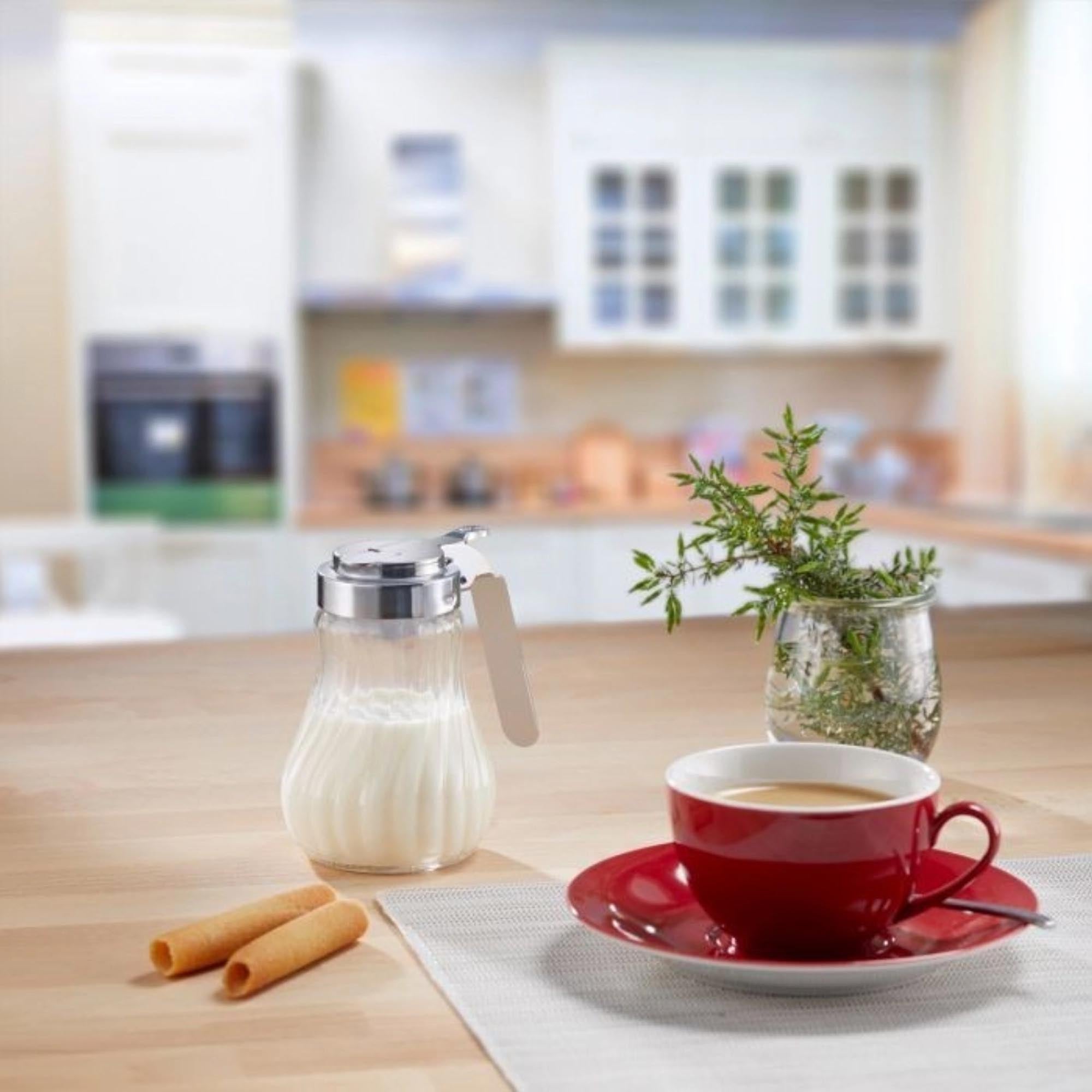 Eleganter Sahnegiesser und Honigspender von Westmark, 250ml, ideal für präzises Dosieren von Sahne und Honig in der Küche.