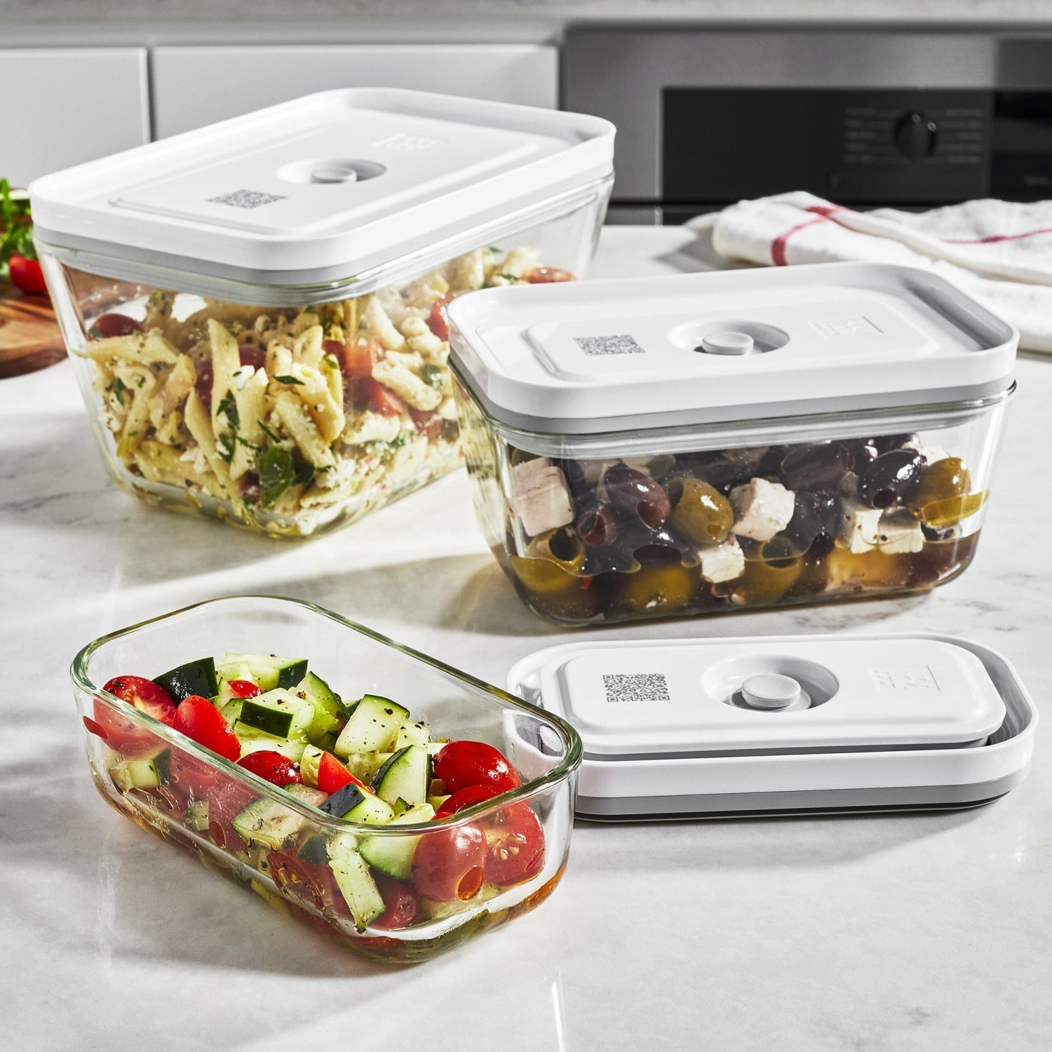 Hochwertige Vakuumboxen aus Glas in drei Größen (S, M, L) von Zwilling Kitchen, ideal für frische und nachhaltige Aufbewahrung.