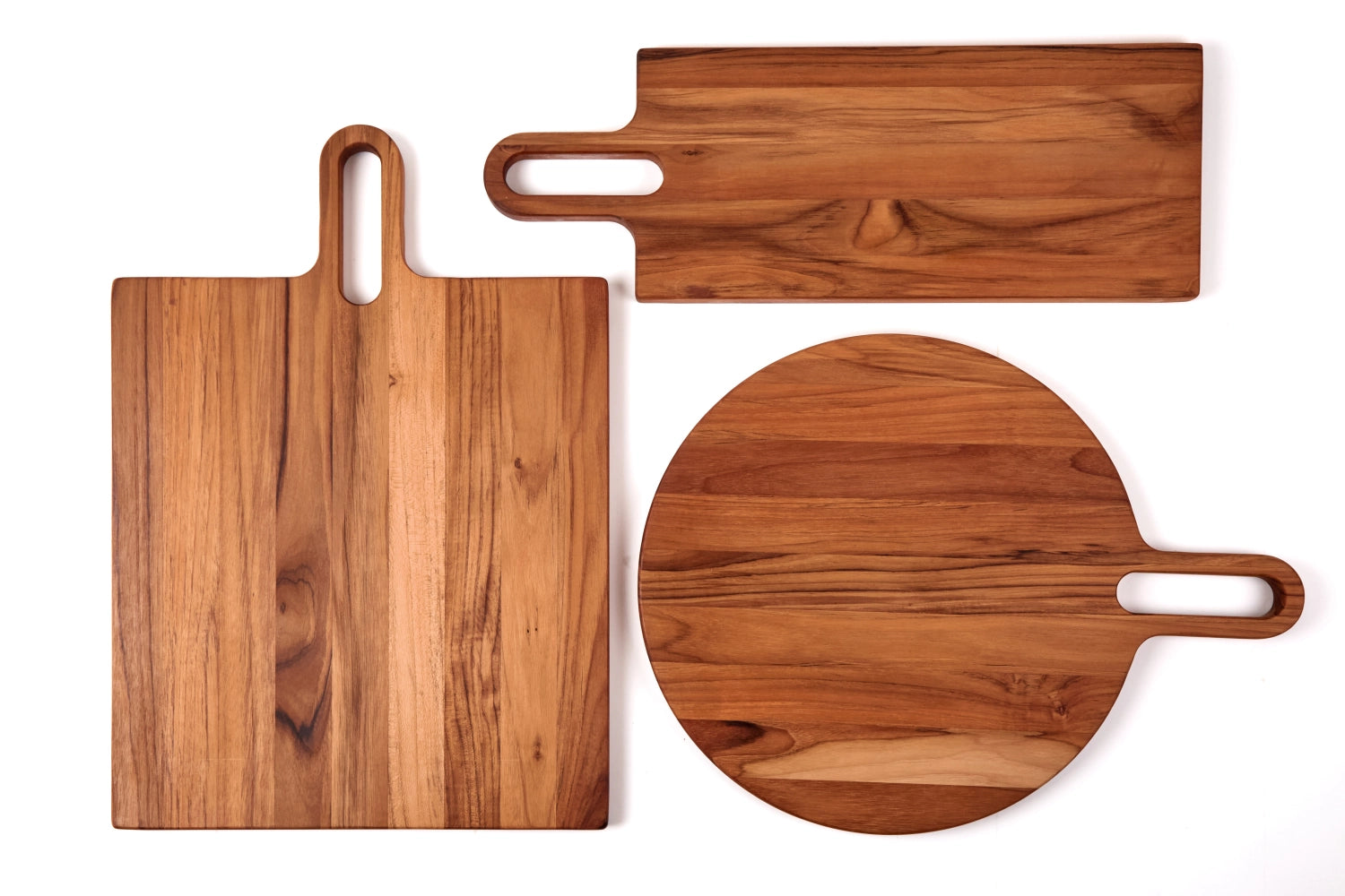 Rundes Bistro Servierbrett aus hochwertigem Teakholz, 51x36x2cm, ideal für stilvolles Servieren und Dekorieren, erhältlich bei KAQTU Design AG.