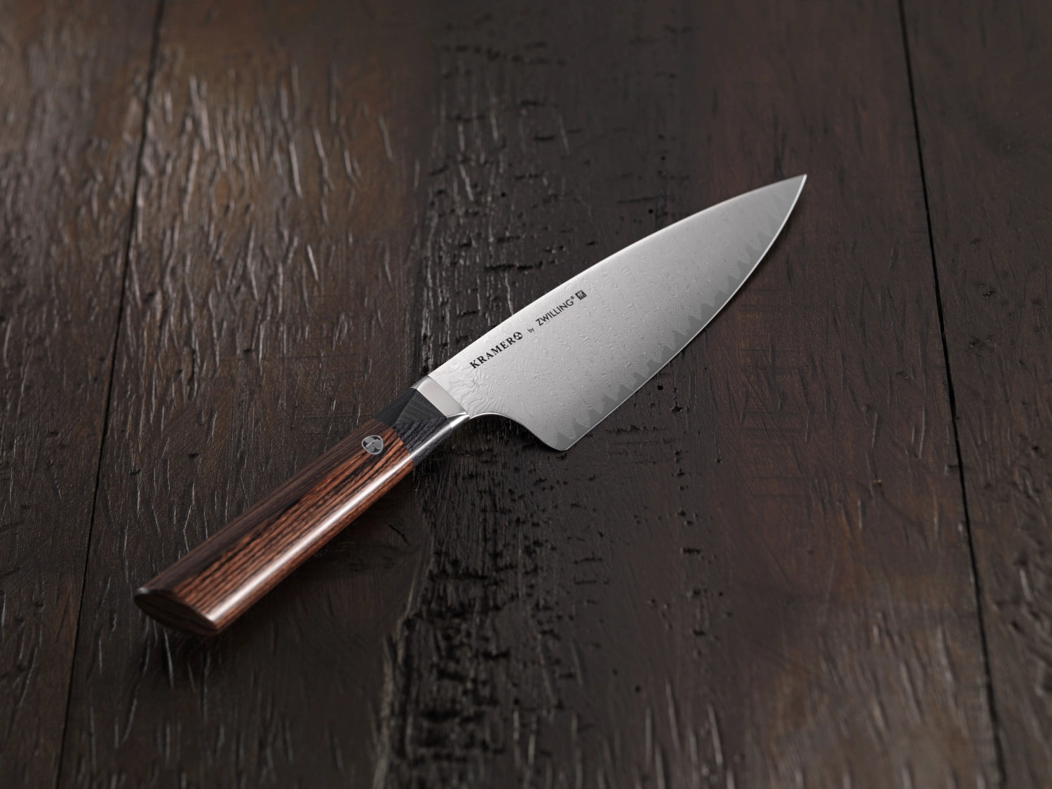 Elegantes Kramer Meiji Kochmesser mit 20 cm Klinge, perfekt für präzise Schneidetechniken, stilvolles Design und komfortabler Griff.