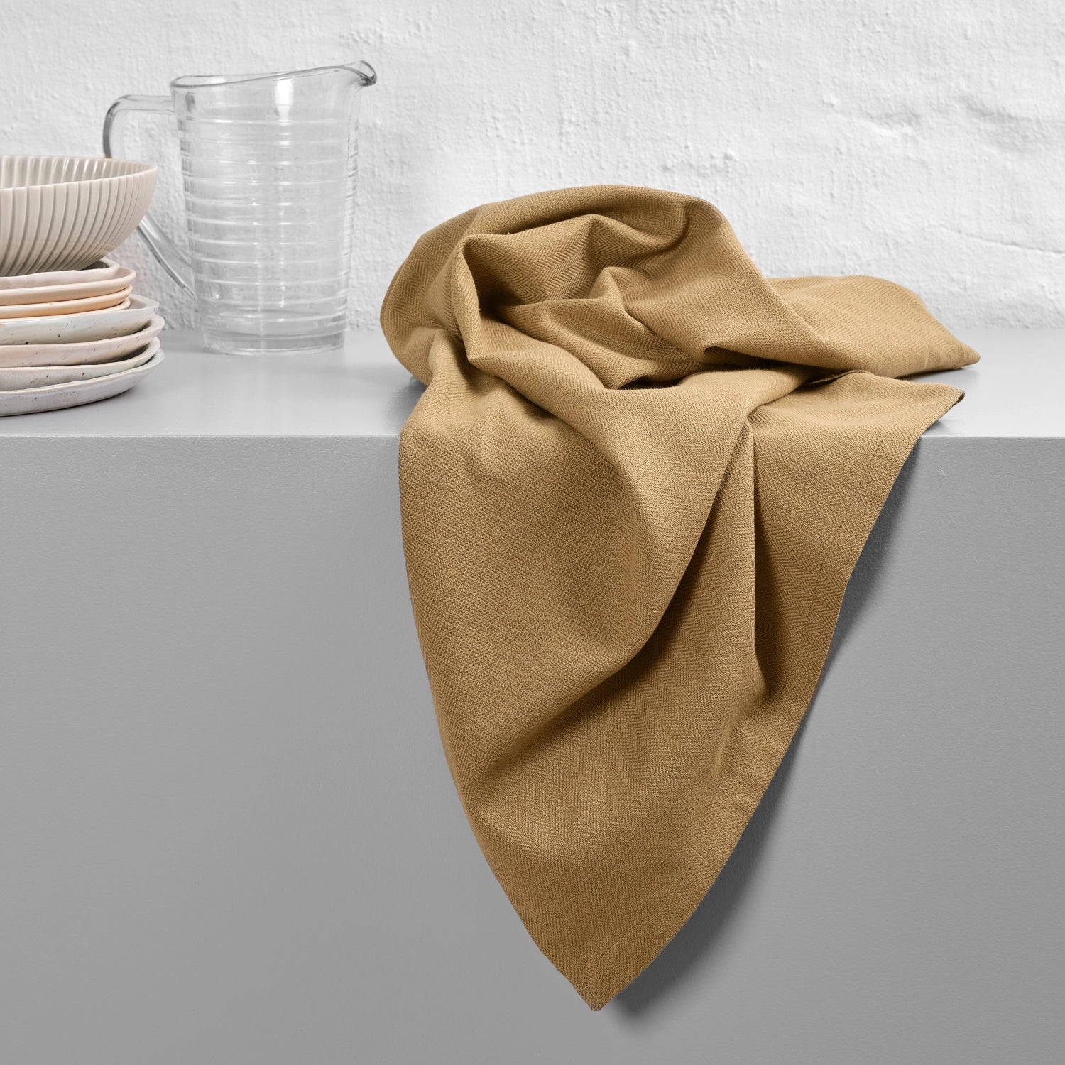 Hochwertiges Geschirrtuch aus Biobaumwolle in khaki, 53x86 cm, von The Organic Company – perfekt für nachhaltige Küchen und umweltbewusste Haushalte.