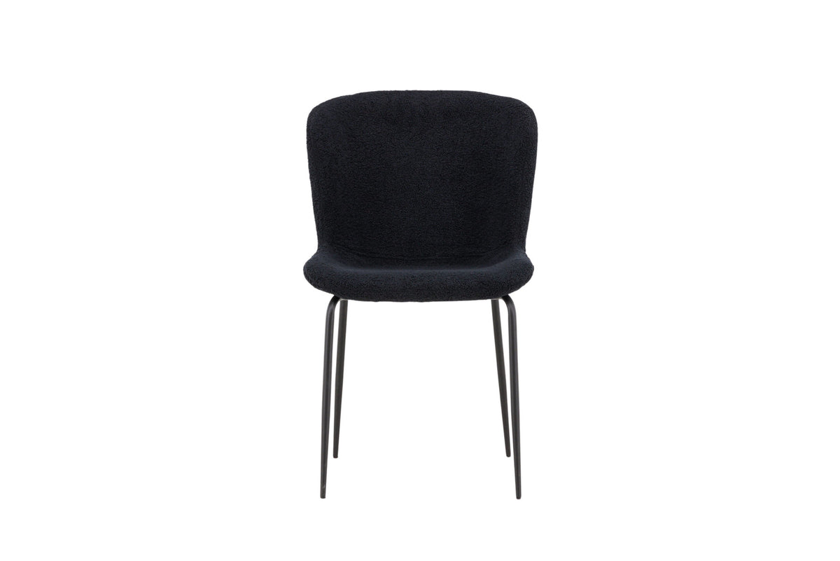 Schwarzer Esszimmerstuhl Modesto mit Sitz aus Polyester Teddy und schlanken Beinen aus Stahl, schlichte Form.