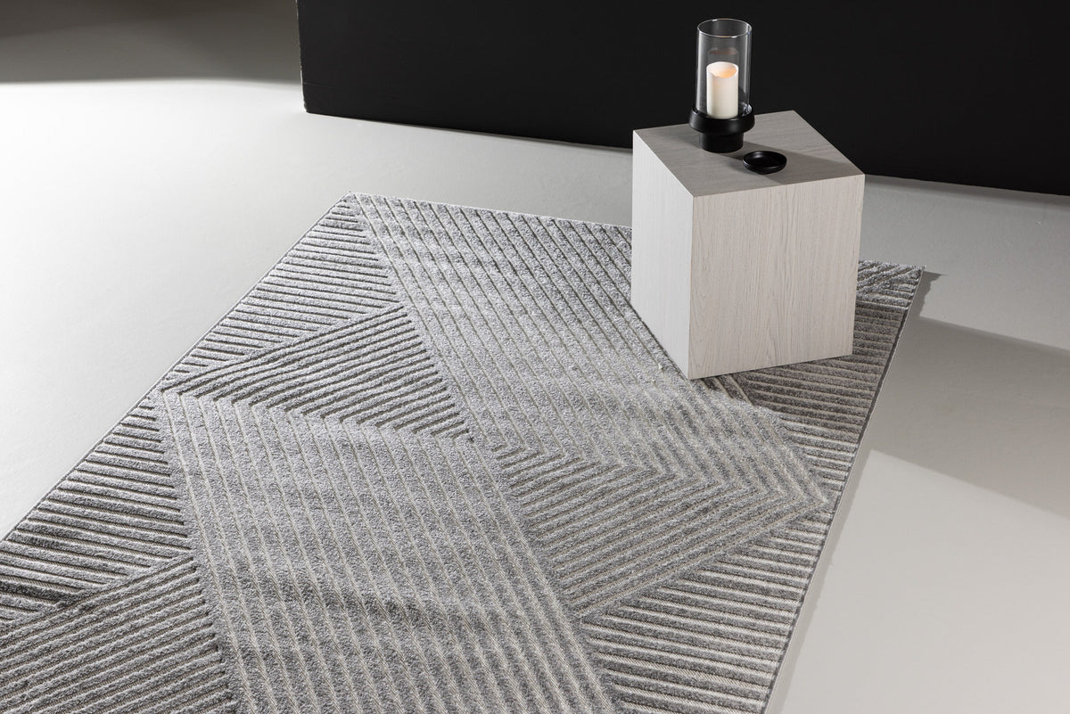 Aron Teppich in Grau präsentiert im Onlineshop von KAQTU Design AG. Teppich ist von Venture Home