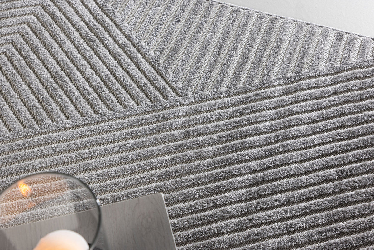 Aron Teppich in Grau präsentiert im Onlineshop von KAQTU Design AG. Teppich ist von Venture Home