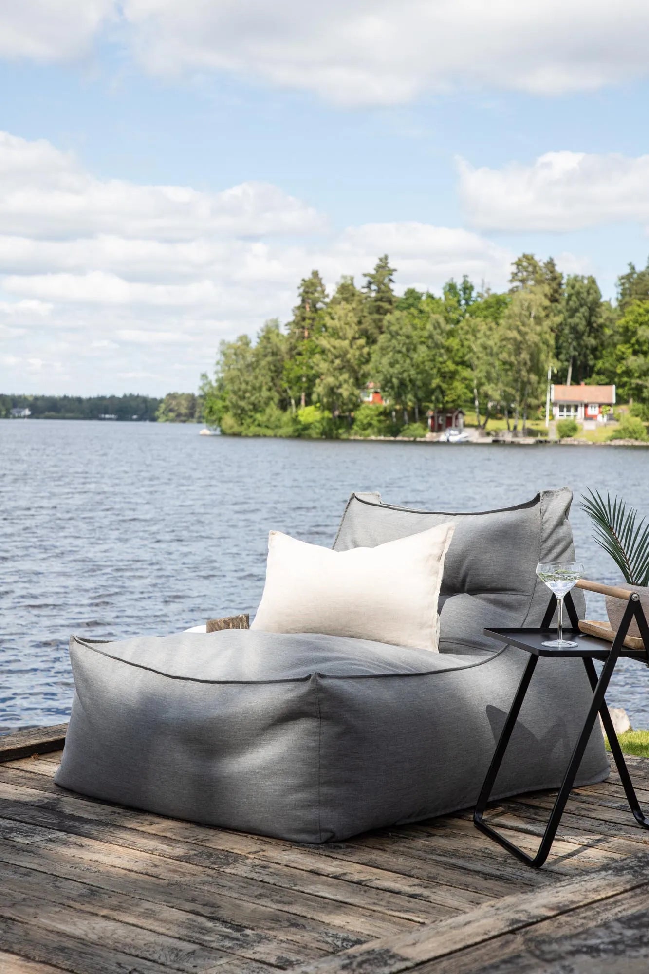 Eleganter Lounge-Stuhl aus Olefin, UV-beständig, beige, ergonomisch, ideal für stilvolle Entspannung im Freien.