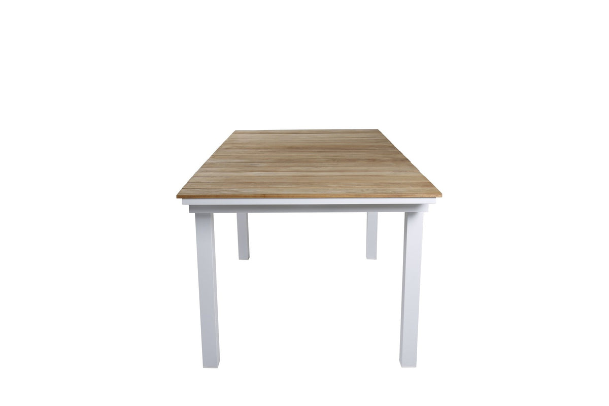 Rechteckiger Gartentisch Mexiko mit naturfarbener Teakholz-Tischplatte und schwarzem Aluminiumgestell, ausziehbar, im Freien aufgestellt.