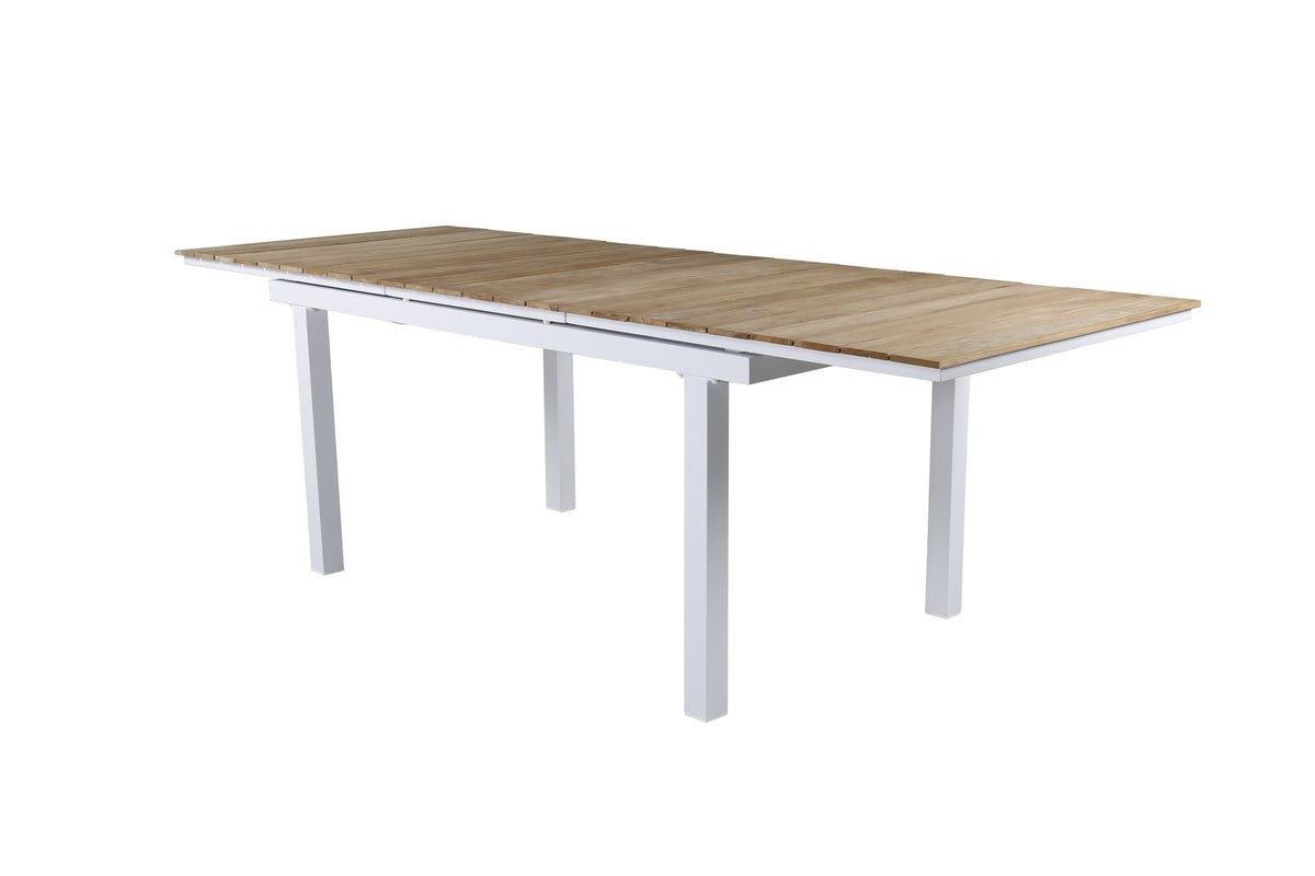 Rechteckiger Gartentisch Mexiko mit naturfarbener Teakholz-Tischplatte und schwarzem Aluminiumgestell, ausziehbar, im Freien aufgestellt.