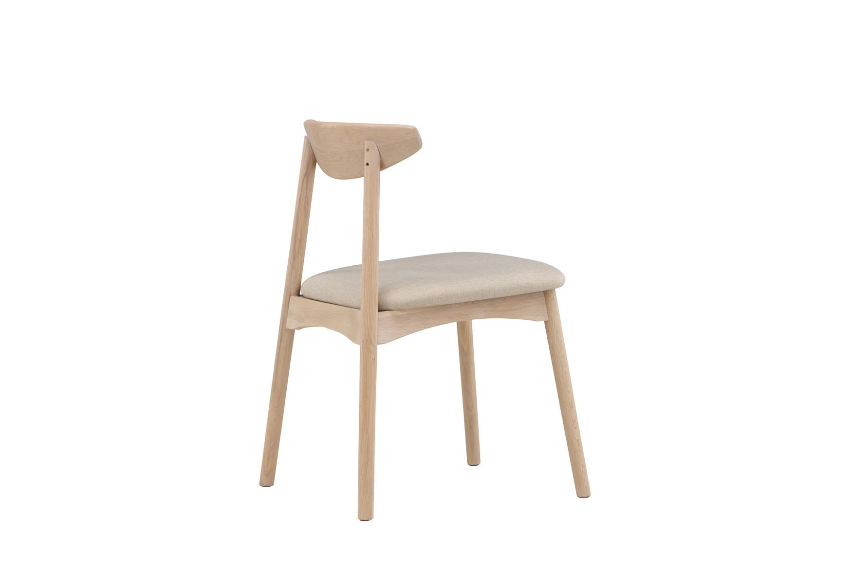 Der Ven Stuhl von Vind vereint elegantes Eichenholz mit ergonomischem Komfort und strapazierfähigen, farbigen Bezügen für jeden Einrichtungsstil.