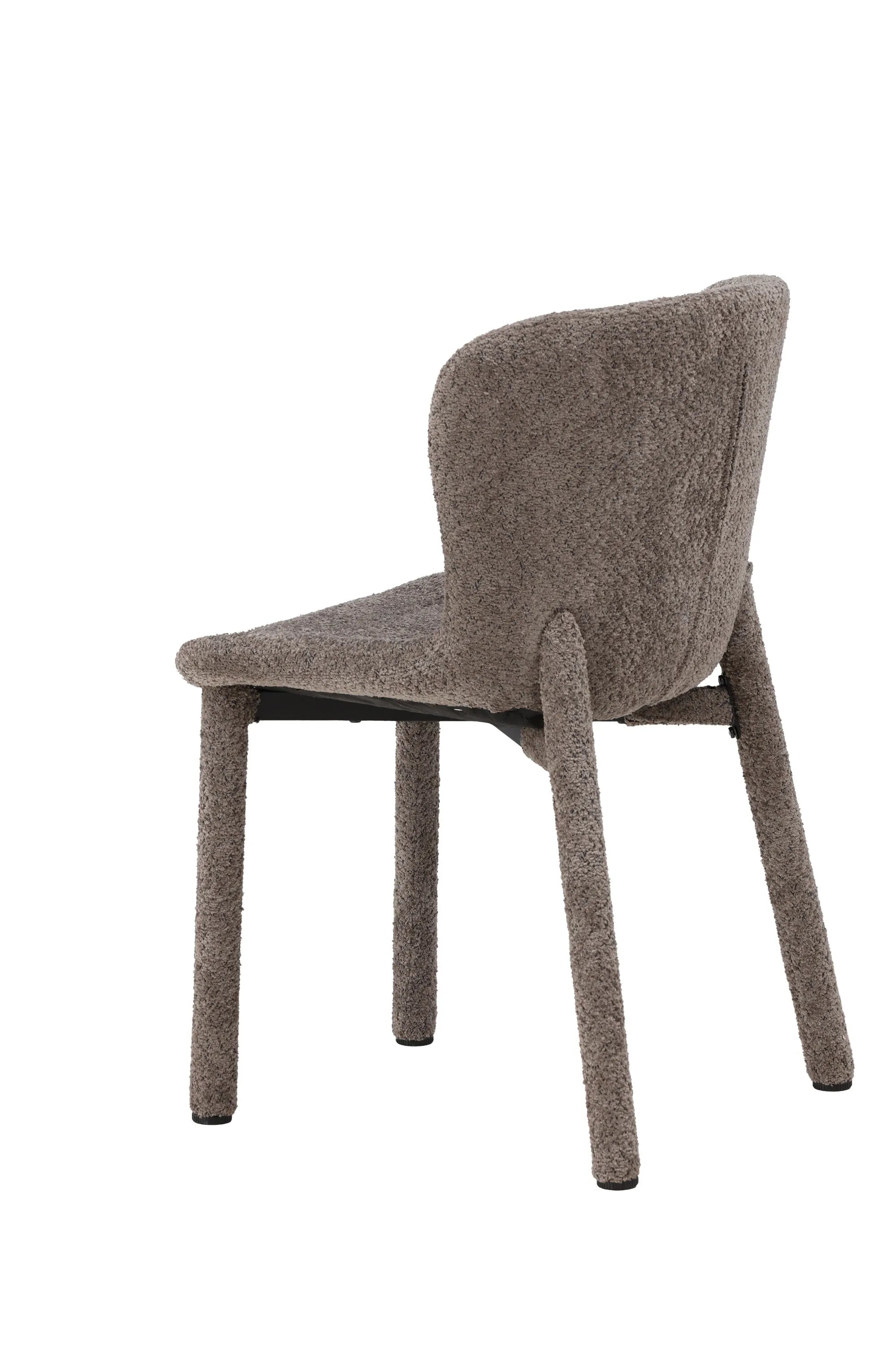 Der Astoria Esszimmerstuhl vereint luxuriösen Bouclé-Stoff mit ergonomischem Design für stilvollen Komfort.