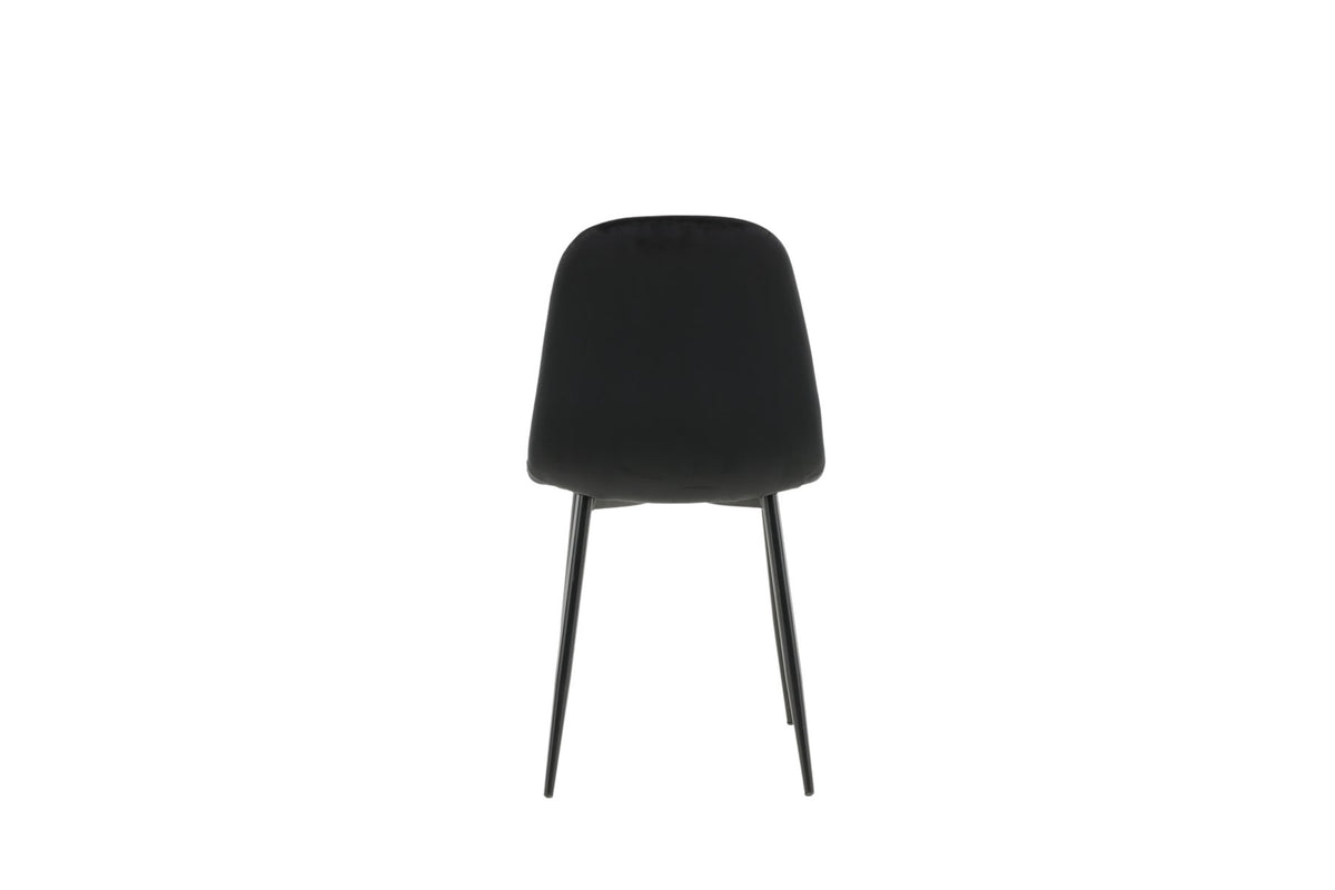 Polar Stuhl von Venture Home mit schwarzem Polyester-Samt-Bezug und schlanken schwarzen Stahlbeinen, runde Silhouette, freigestellt.