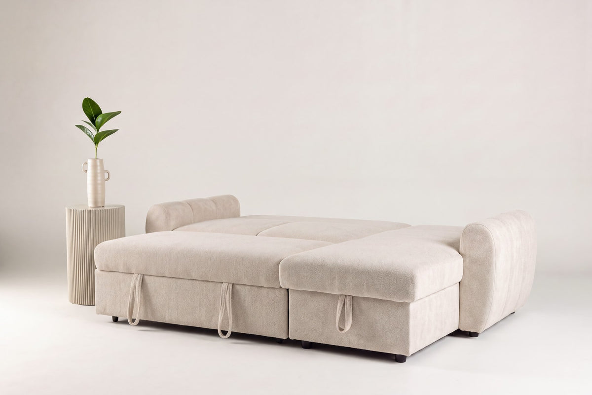 Beige Bettsofa Teo von Venture Home mit Polyesterbezug, Eukalyptusanteil und schwarzen Beinen, im aufgeklappten Zustand als Bett gezeigt.
