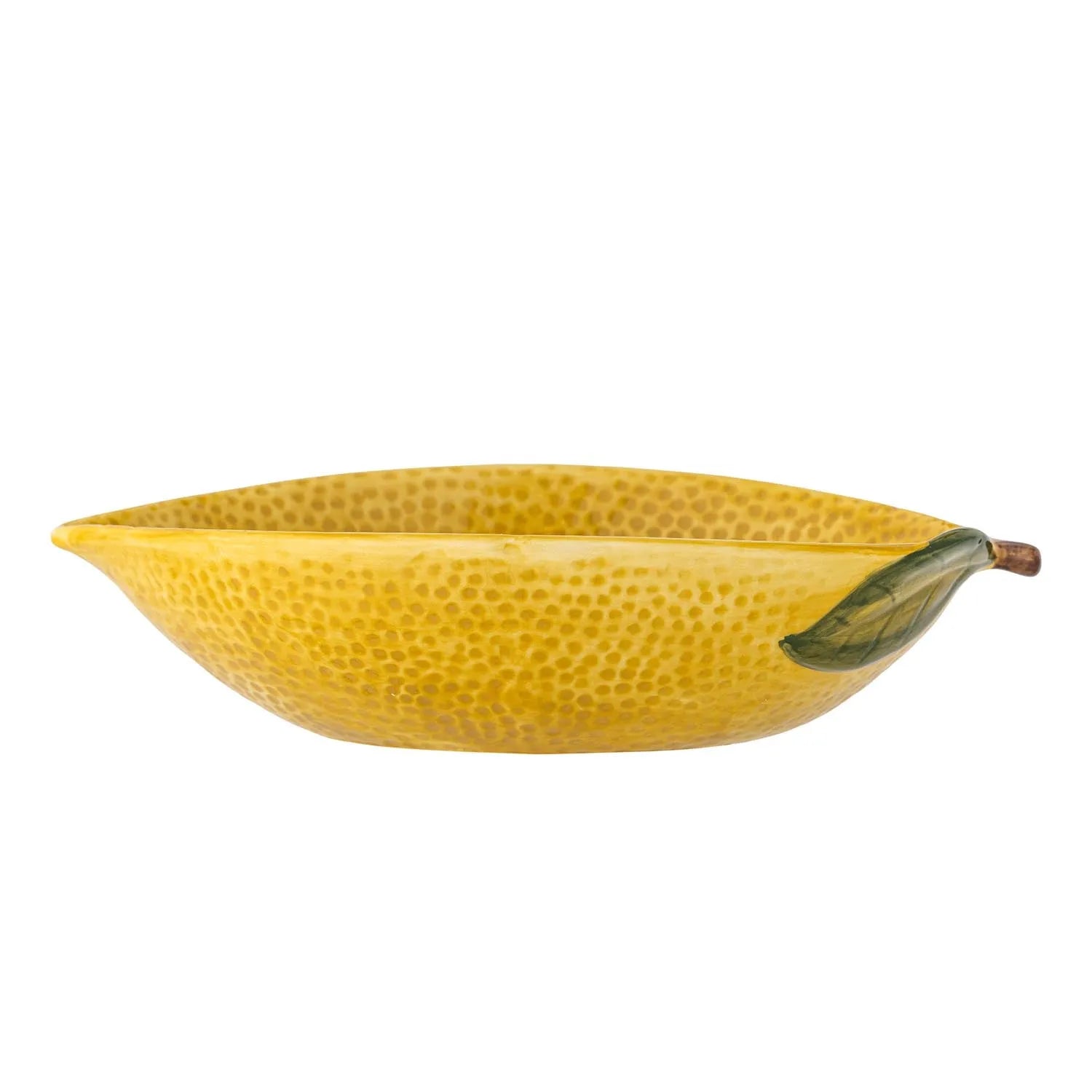 Dekorative Schale aus gelbem Steingut in Form einer Limone, ideal für stilvolle Akzente und kreative Wohnraumgestaltung.
