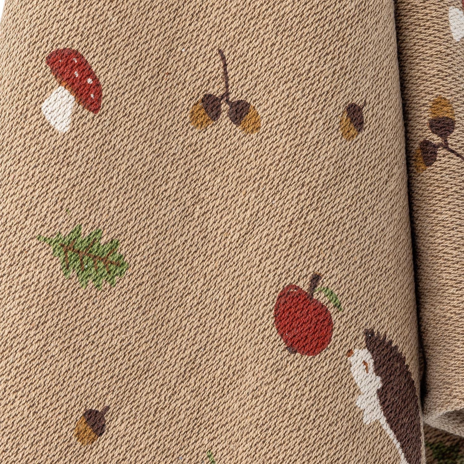Kuschelige braune Decke aus recycelter Baumwolle von Bloomingville Mini, ideal für kühle Tage, nachhaltig und stilvoll.