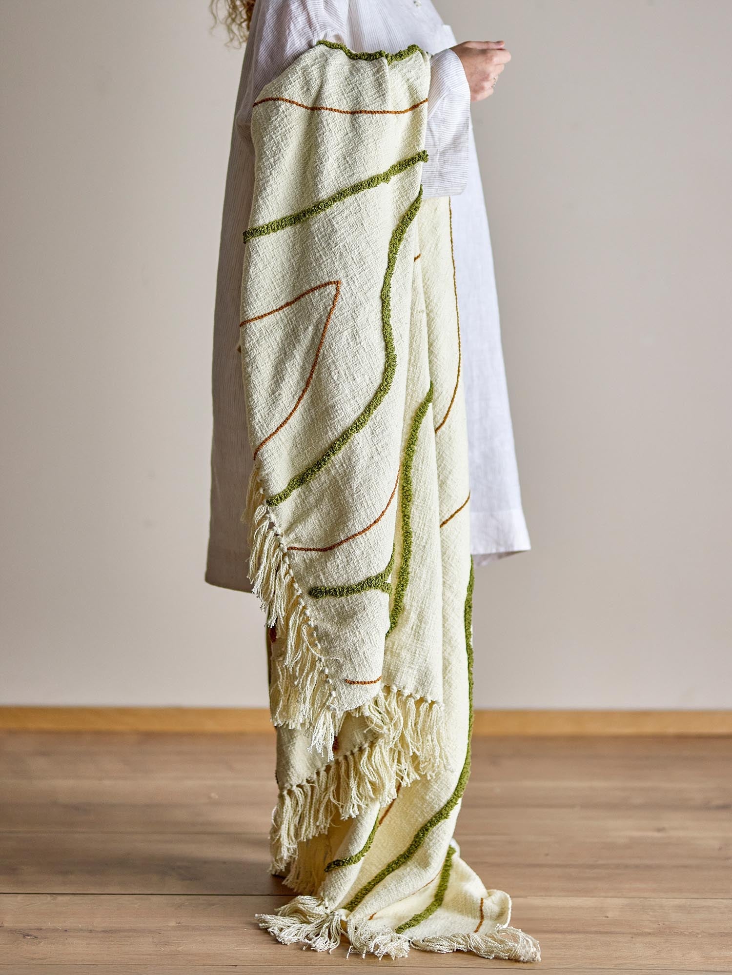 Die Osasio Decke in Grün von Bloomingville vereint Stil und Komfort mit OEKO-TEX® zertifizierter Baumwolle.