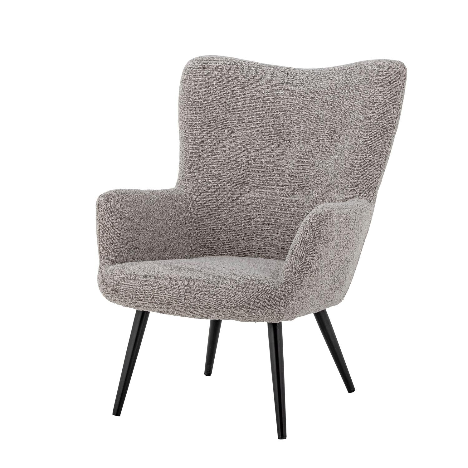Der Perry Loungesessel von Bloomingville vereint stilvolles Design mit Komfort, gefertigt aus natürlichem Polyester in sanften Tönen.