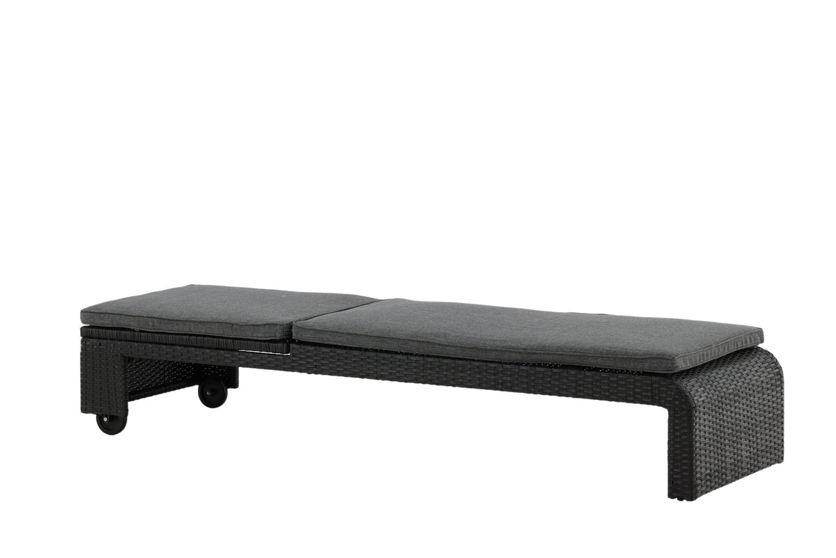 Sonnenliege London von Venture Home in Schwarz mit grauem Kissen und Korbgeflecht