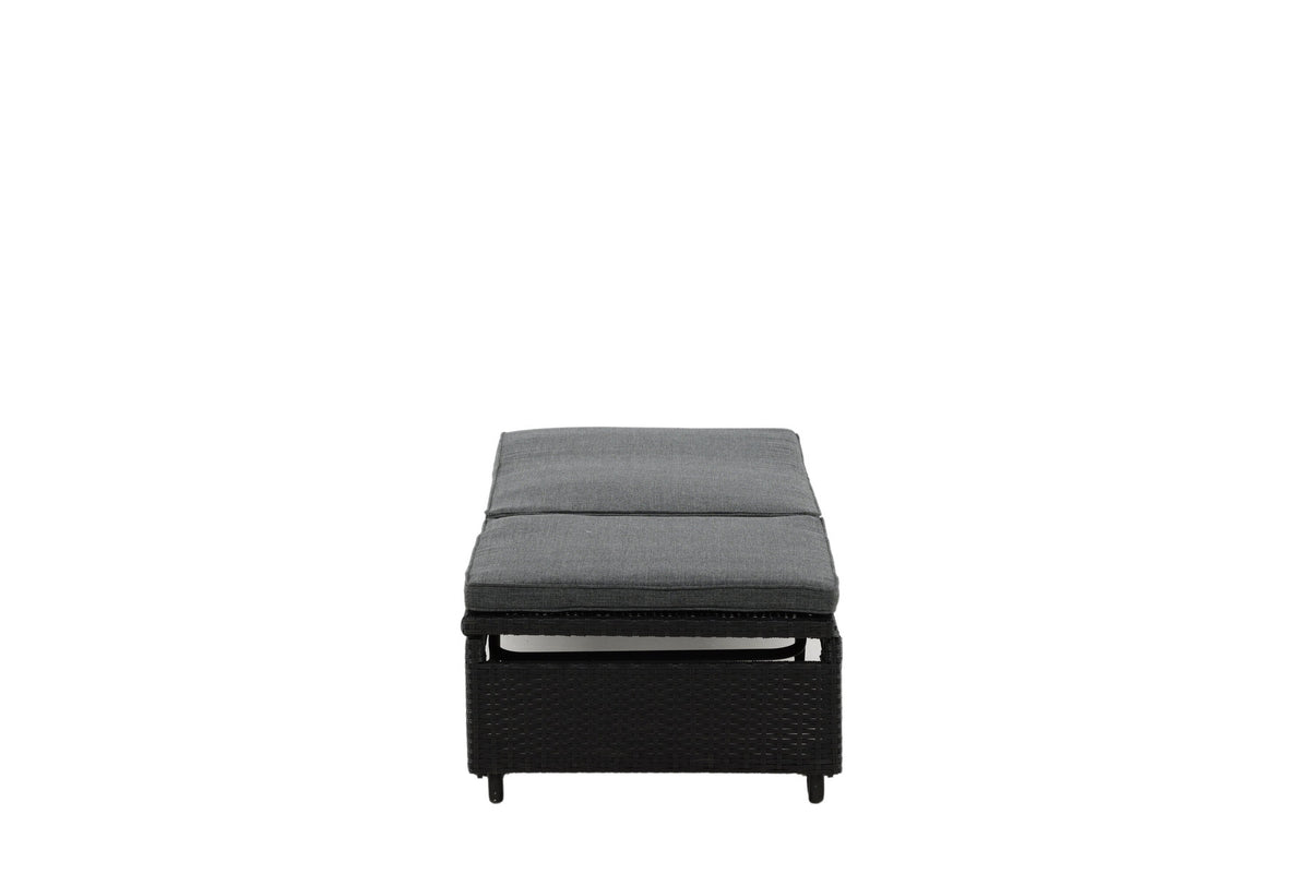 Sonnenliege London von Venture Home in Schwarz mit grauem Kissen und Korbgeflecht