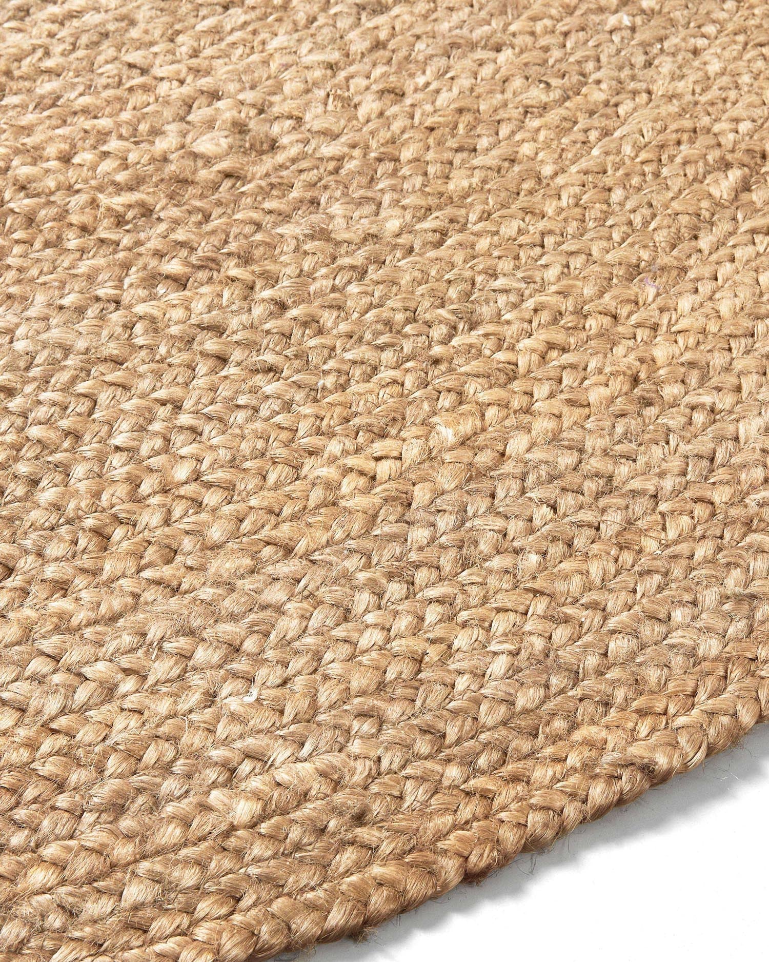 Natürlicher Jute-Teppich, rund, Ø 150 cm, von Kave Home. Nachhaltig, vielseitig und perfekt für ein stilvolles Ambiente.