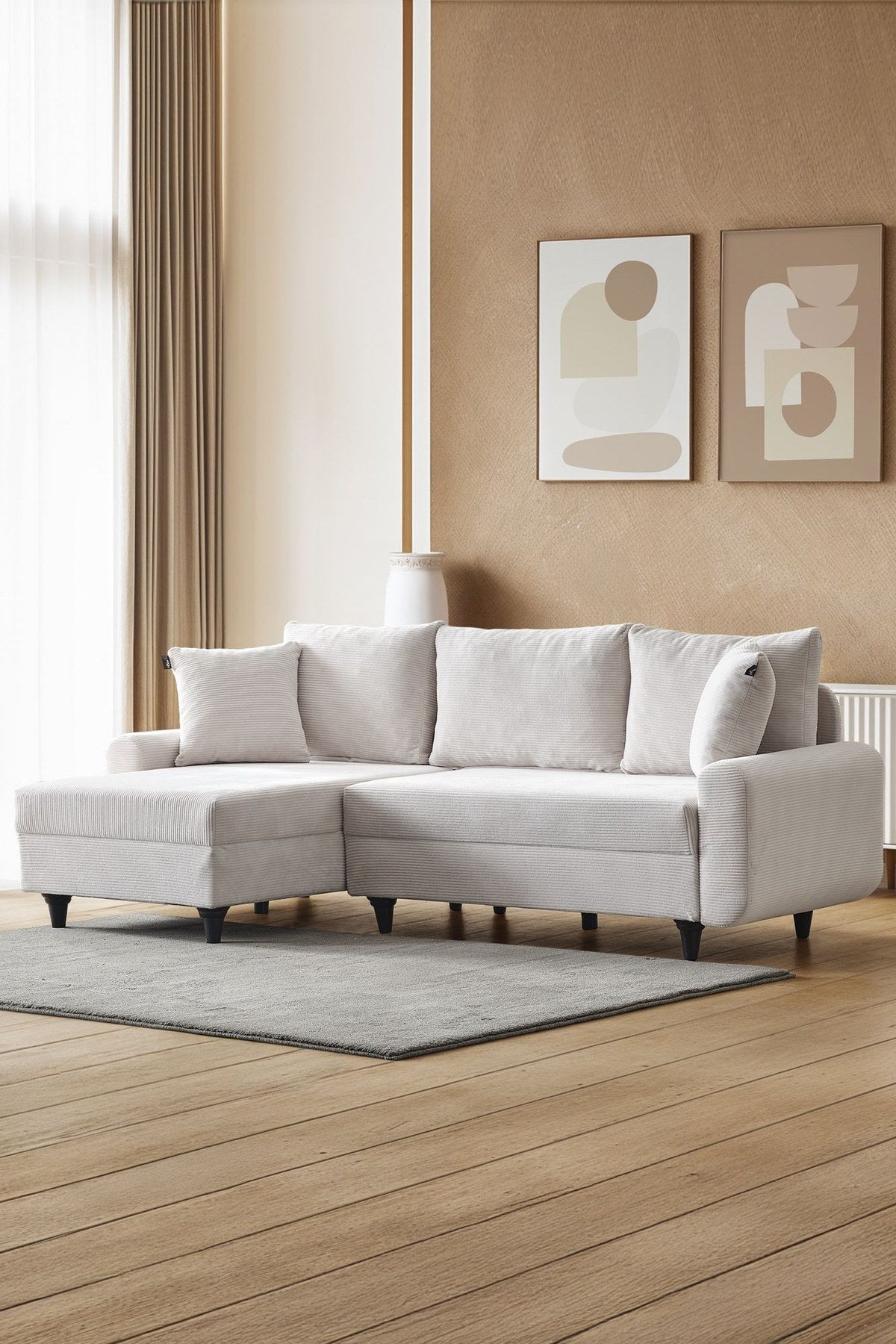 Weisses Ecksofa Flavia von Hanah Home mit Polyesterbezug in Leinenstruktur, Metallgestell und Kunststoffbeinen, fotografiert freistehend.