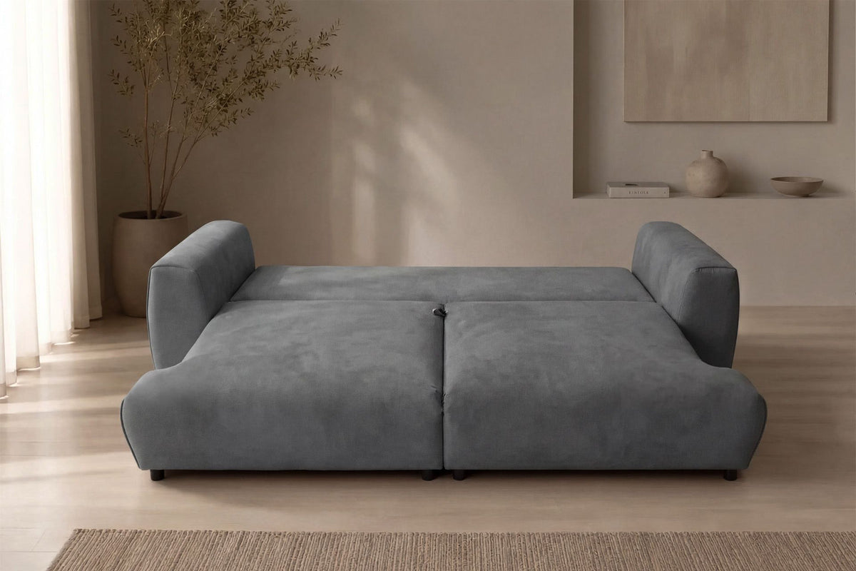 Graues 3-Sitzer Schlafsofa Arthur von Hanah Home mit Polyesterbezug, Buchenholzgestell und Kunststoffbeinen, zwei Kissen auf der Sitzfläche
