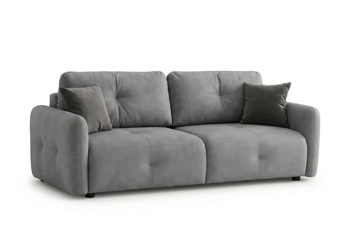Graues 3-Sitzer Schlafsofa Magic von Hanah Home mit Polyesterbezug, Kunststoffbeinen und zwei Kissen auf hellem Hintergrund.