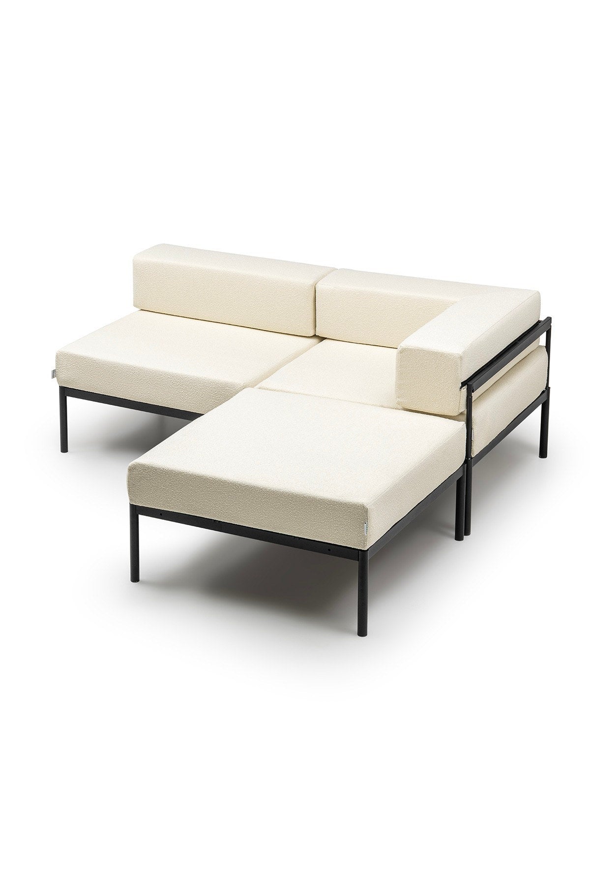 Ecksofa in Schwarz und Creme mit Bouclé-Stoff, Metallgestell und Metallbeinen, abnehmbare Sitzkissen, Grösse 180 x 180 cm.