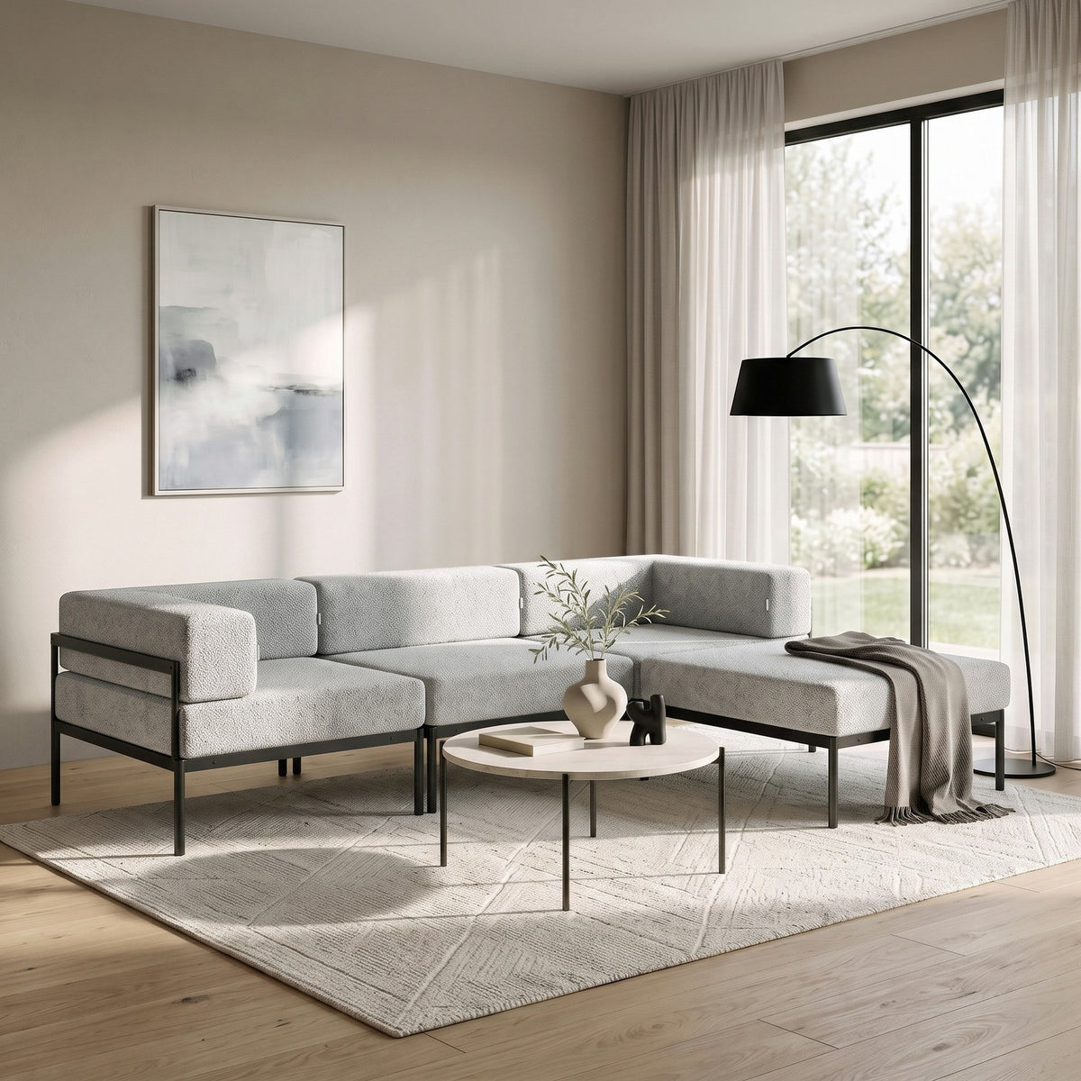 Ecksofa Corner Set 270 von Hanah Home in Schwarz und Grau, Bouclé-Stoff, Metallbeine, breite Sitzfläche und Rückenlehne.