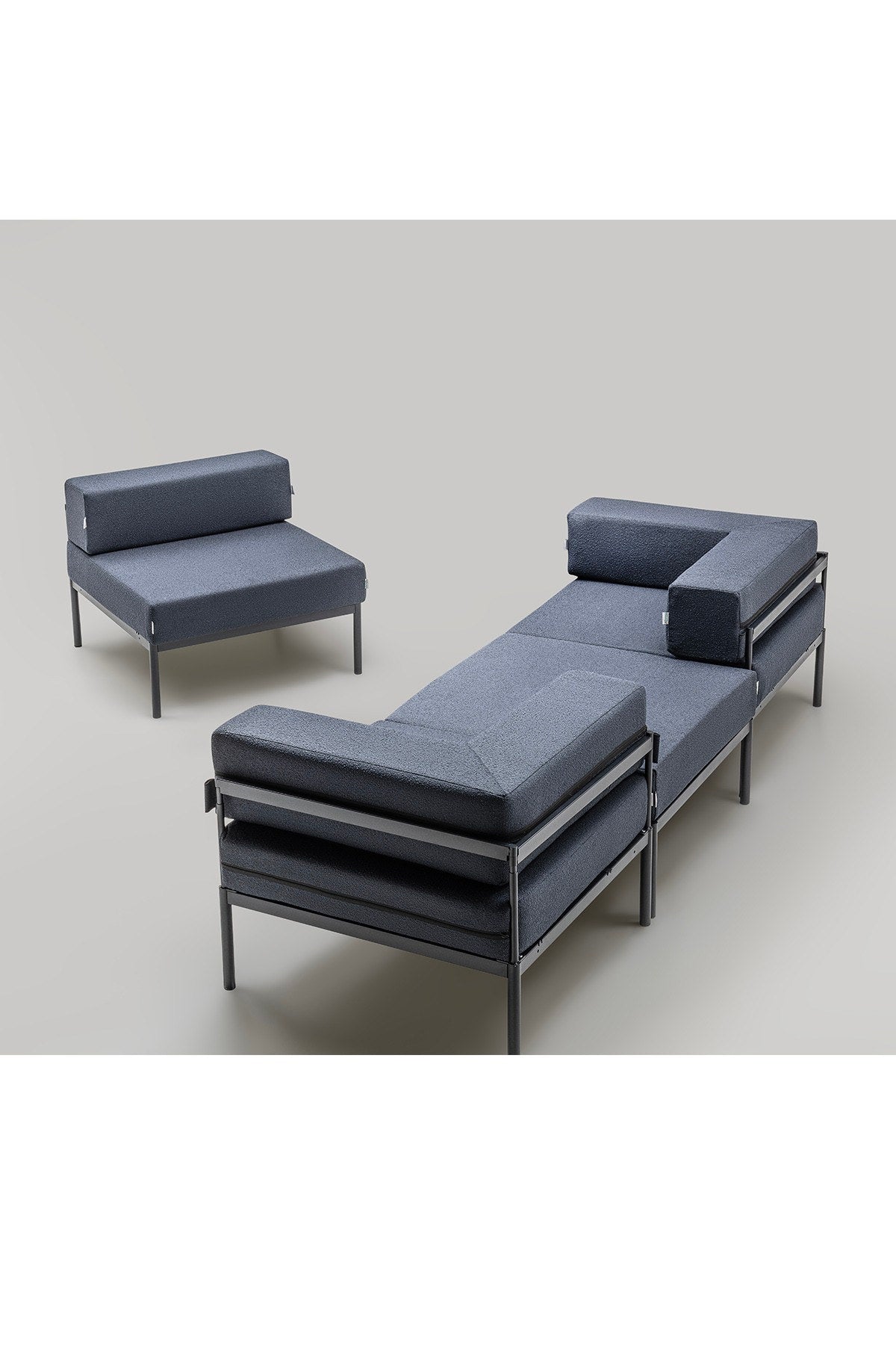 Ecksofa Corner Set 270 von Hanah Home in Schwarz und Marineblau mit Bouclé-Stoff-Bezug, Metallgestell und Metallbeinen.